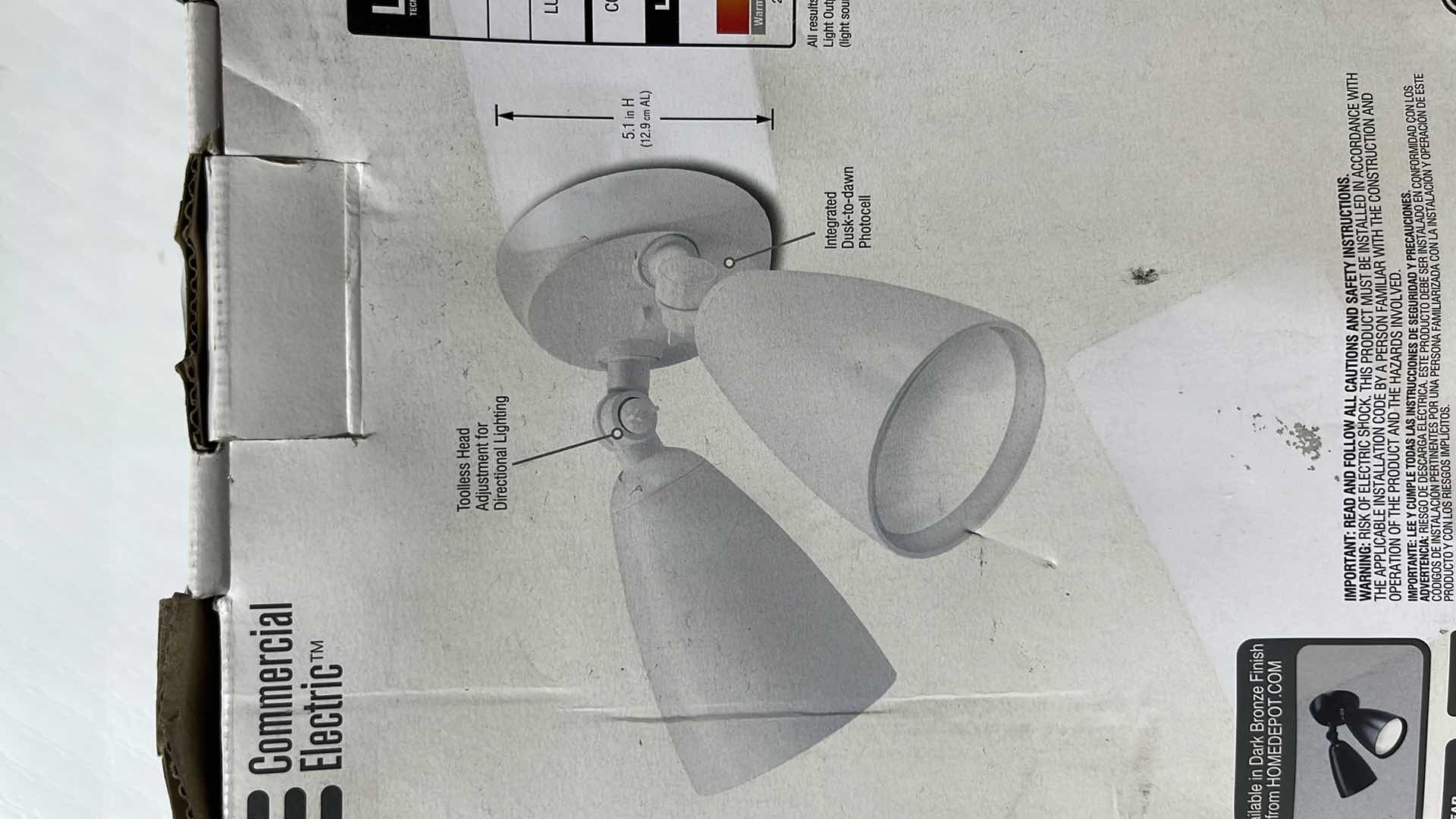 Photo 1 of COMMERCIAL ELECTRIC LED TWIN HEAD PAR FLOOD LIGHT, WALL/EAVE MOUNTABLE, 1500 LUMENS, WHITE FINISH (1006 559 581)