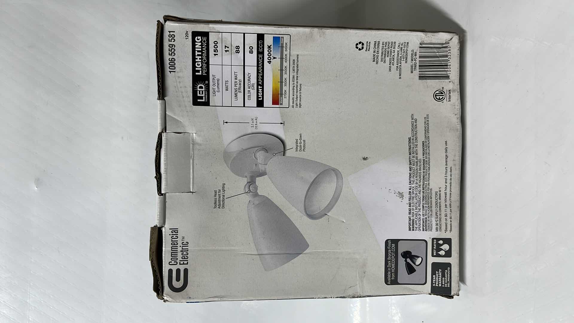 Photo 1 of COMMERCIAL ELECTRIC LED TWIN HEAD PAR FLOOD LIGHT, WALL/EAVE MOUNTABLE, 1500 LUMENS, WHITE FINISH (1006 559 581)