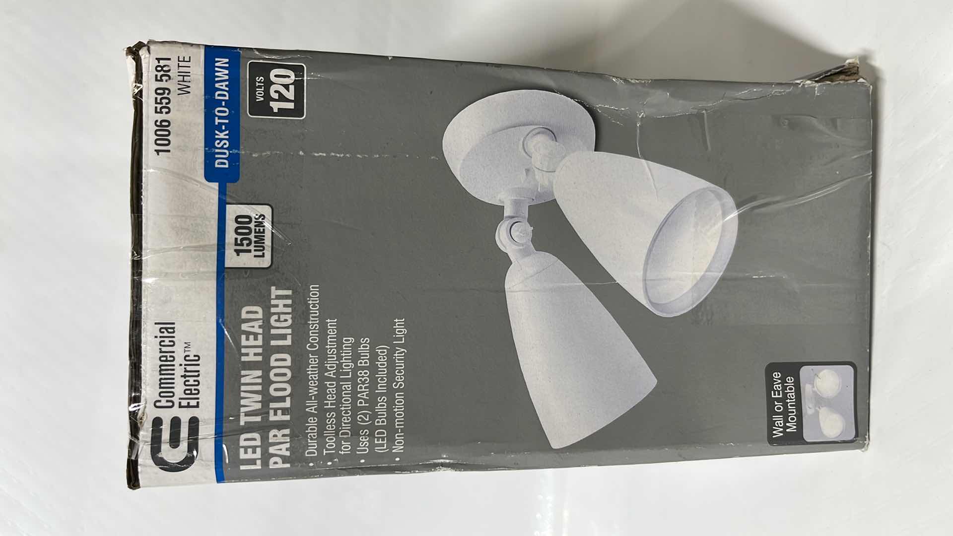 Photo 1 of COMMERCIAL ELECTRIC LED TWIN HEAD PAR FLOOD LIGHT, WALL/EAVE MOUNTABLE, 1500 LUMENS, WHITE FINISH (1006 559 581)