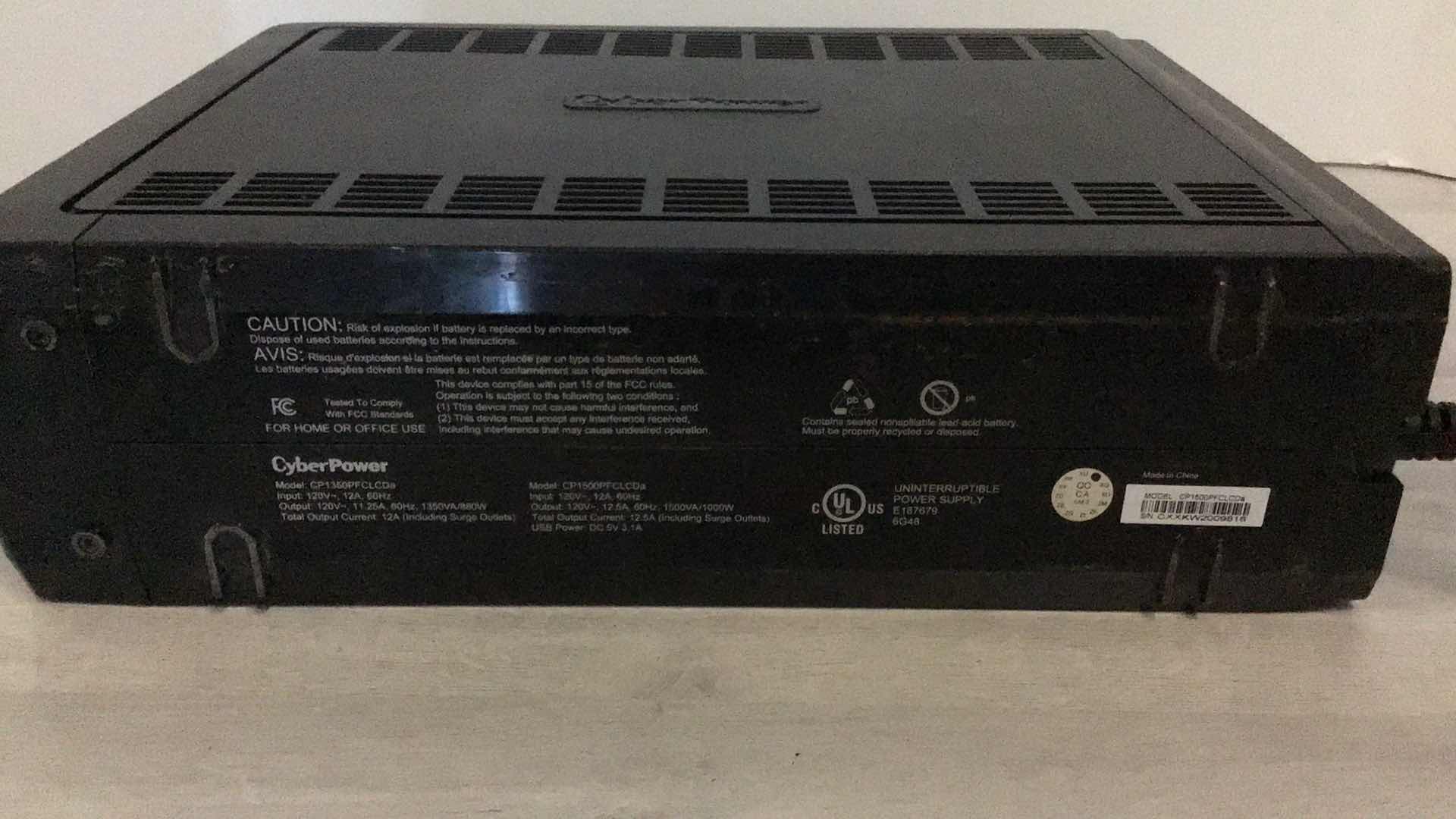Photo 1 of CYBERPOWER PFC SINEWAVE UPS SYSTEM 1500VA/1000W 12 OUTLET MODEL CP1500PFCLCD
