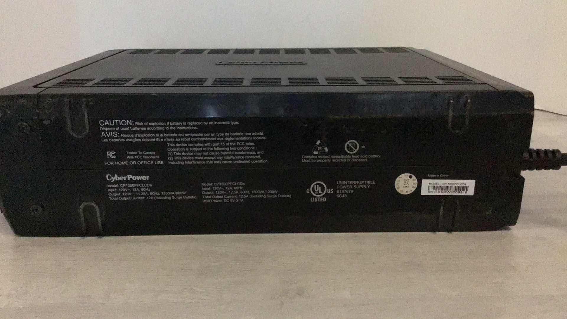 Photo 1 of CYBERPOWER PFC SINEWAVE UPS SYSTEM 1500VA/1000W 12 OUTLET MODEL CP1500PFCLCD