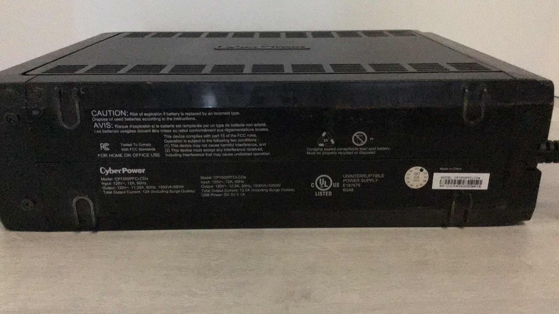 Photo 1 of CYBERPOWER PFC SINEWAVE UPS SYSTEM 1500VA/1000W 12 OUTLET MODEL CP1500PFCLCD