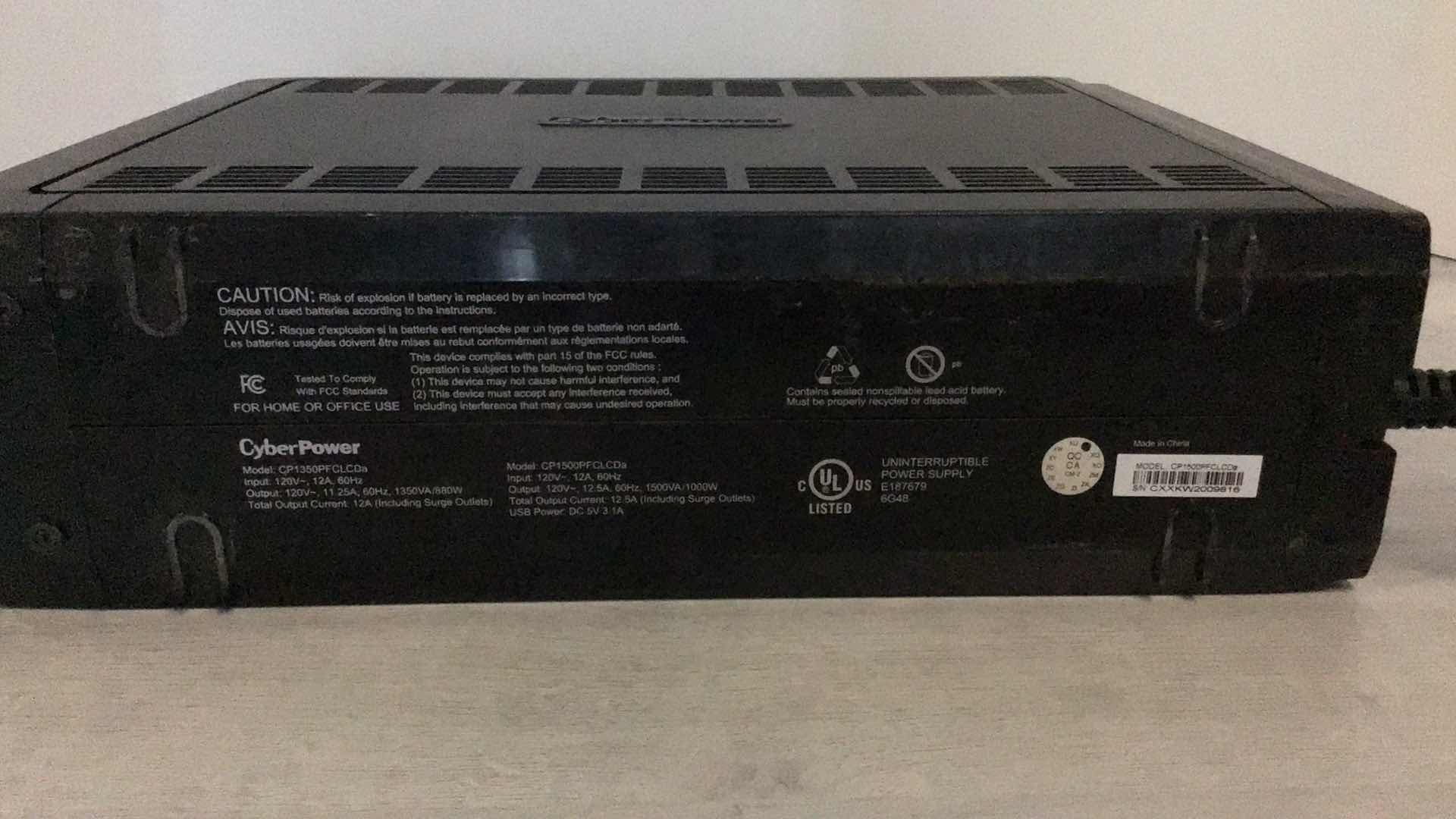 Photo 1 of CYBERPOWER PFC SINEWAVE UPS SYSTEM 1500VA/1000W 12 OUTLET MODEL CP1500PFCLCD