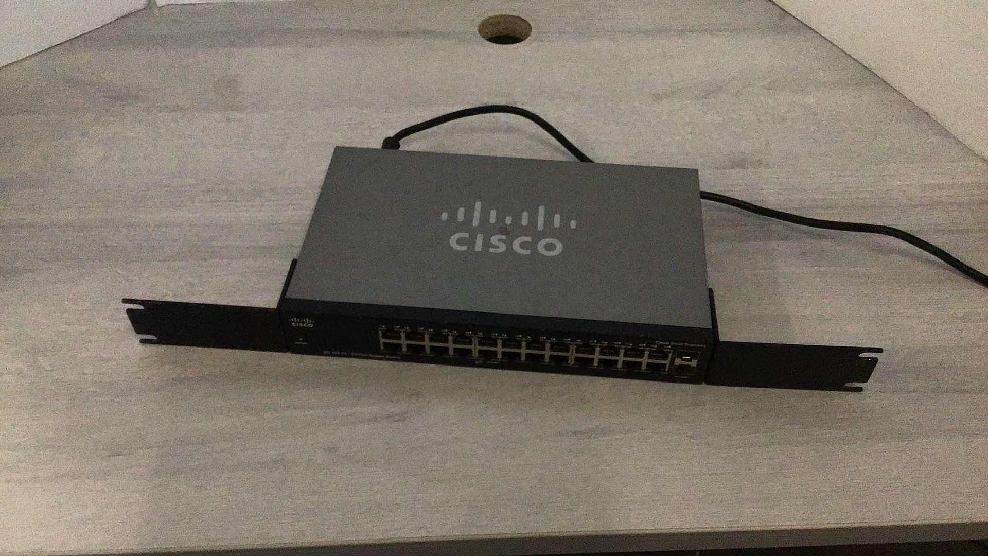 Photo 1 of CISCO V2 COMPACT 24-PORT UNMANAGED GIGABIT SWITCH W RACK MOUNT SG102-24