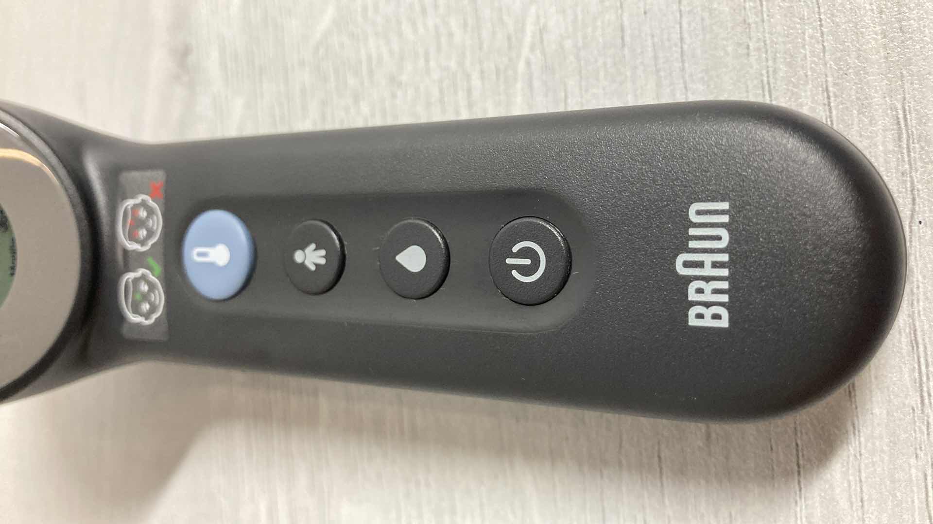 Photo 1 of BRAUN 3 IN 1 NO TOUCH INFRARED THERMOMETER