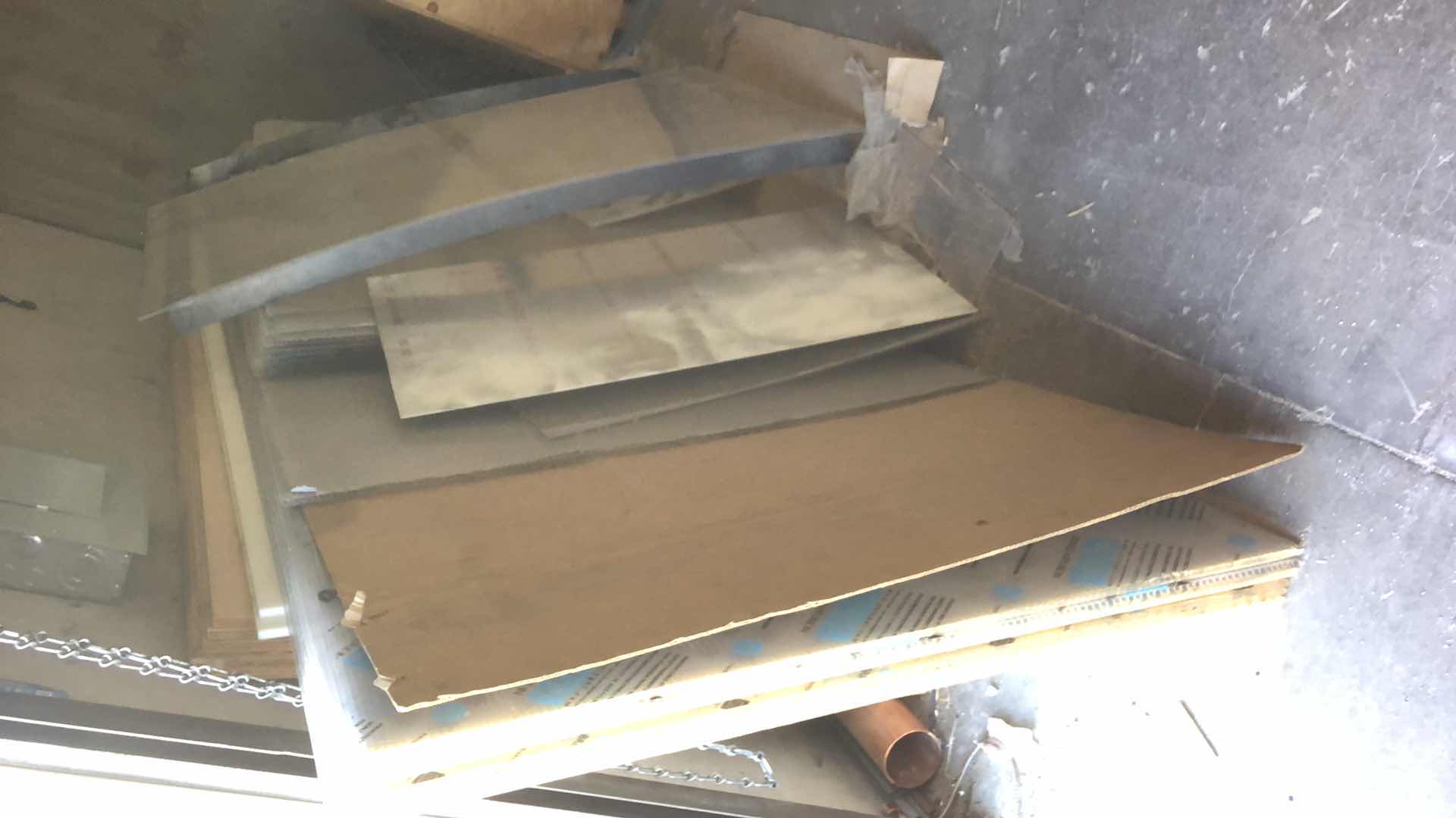 Photo 1 of ASSORTMENT OF MATERIALS SHEET PLASTIC, METAL, PLYWOOD, PLEXIGLASS