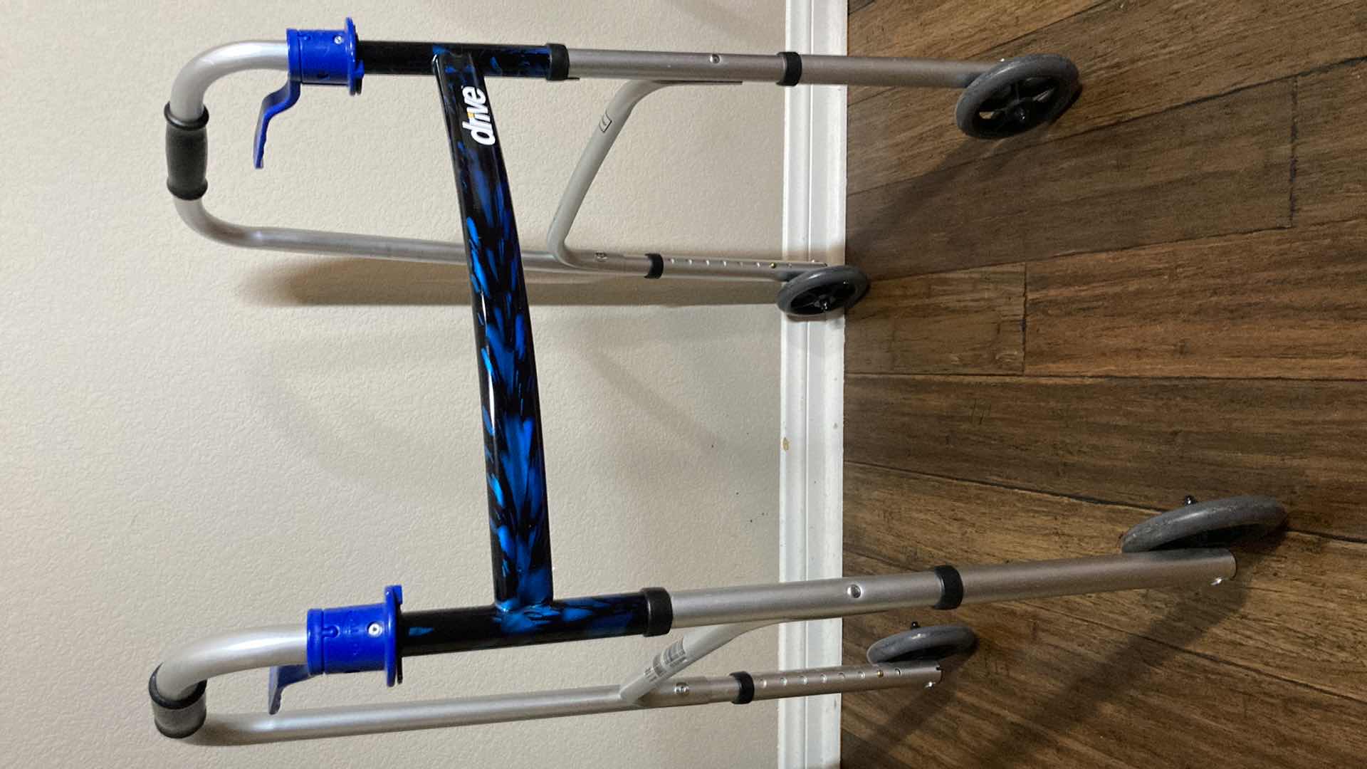 Photo 1 of DRIVE DELUXE TRIGGER RELEASE BLUE FLAME 350LB CAP FOLDING WALKER W ATTACHMENTS