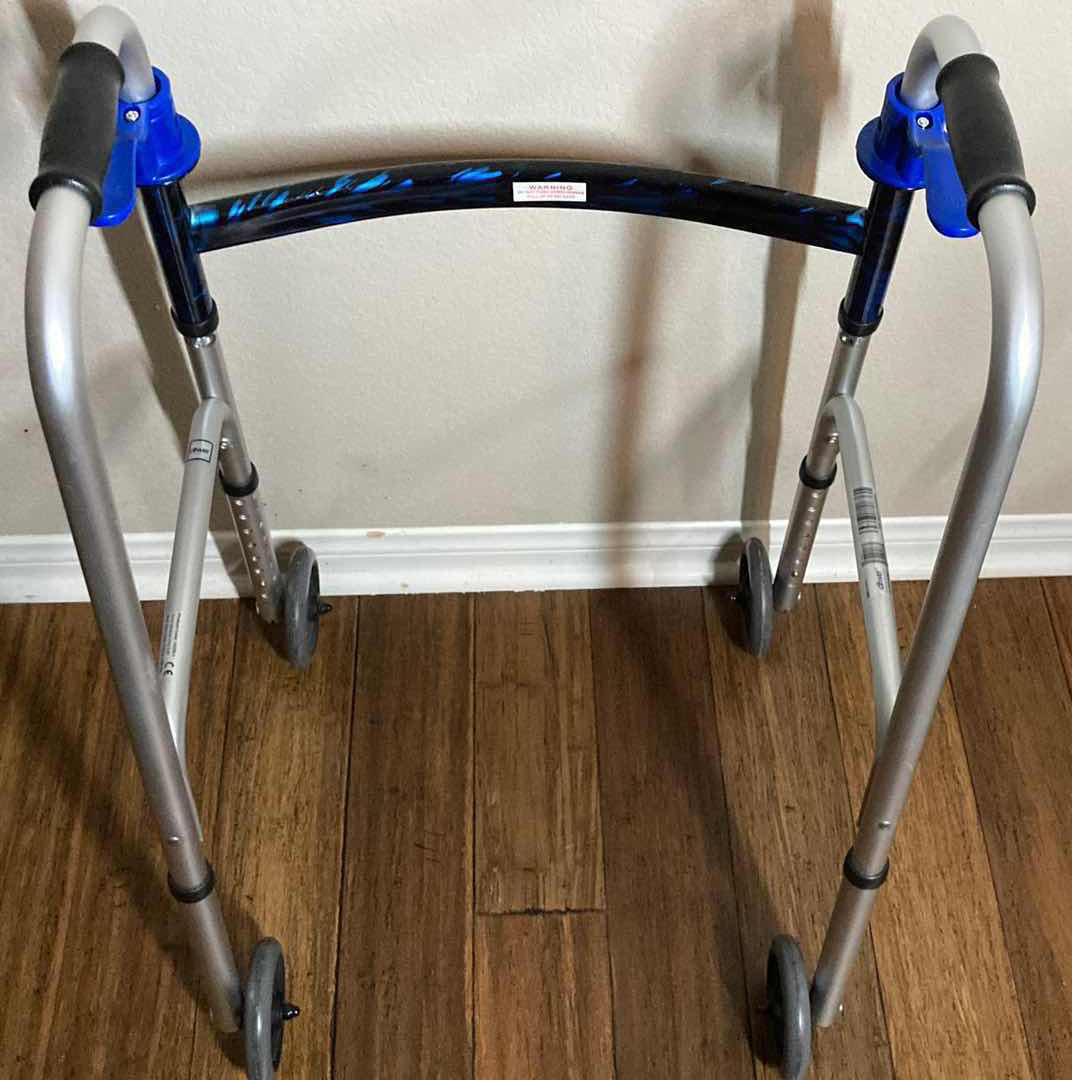 Photo 1 of DRIVE DELUXE TRIGGER RELEASE BLUE FLAME 350LB CAP FOLDING WALKER W ATTACHMENTS