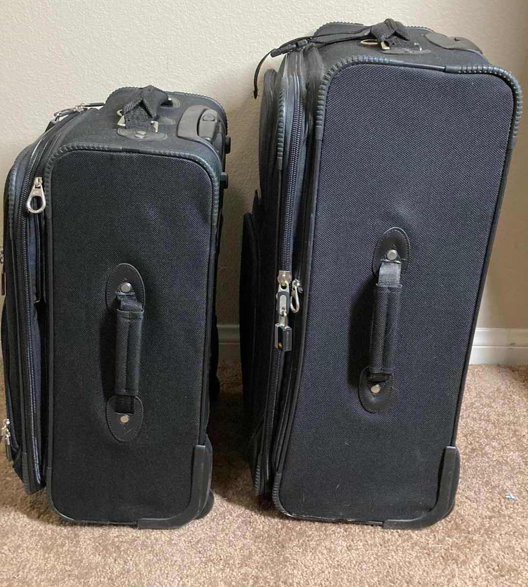 Photo 1 of AMERICAN TOURNAMENT ROLLING CHECK BAG & ROLLING CARRY ON BAG SET