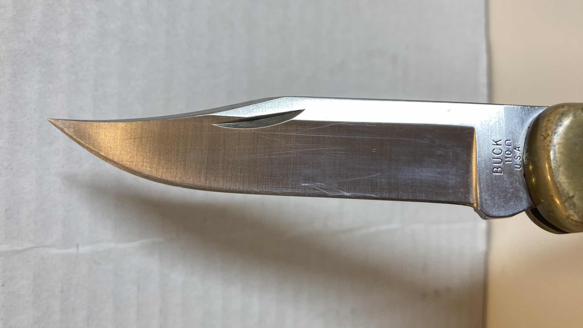 Photo 1 of BUCK 110 FOLDING KNIFE 3.75” W LEATHER SHEATH