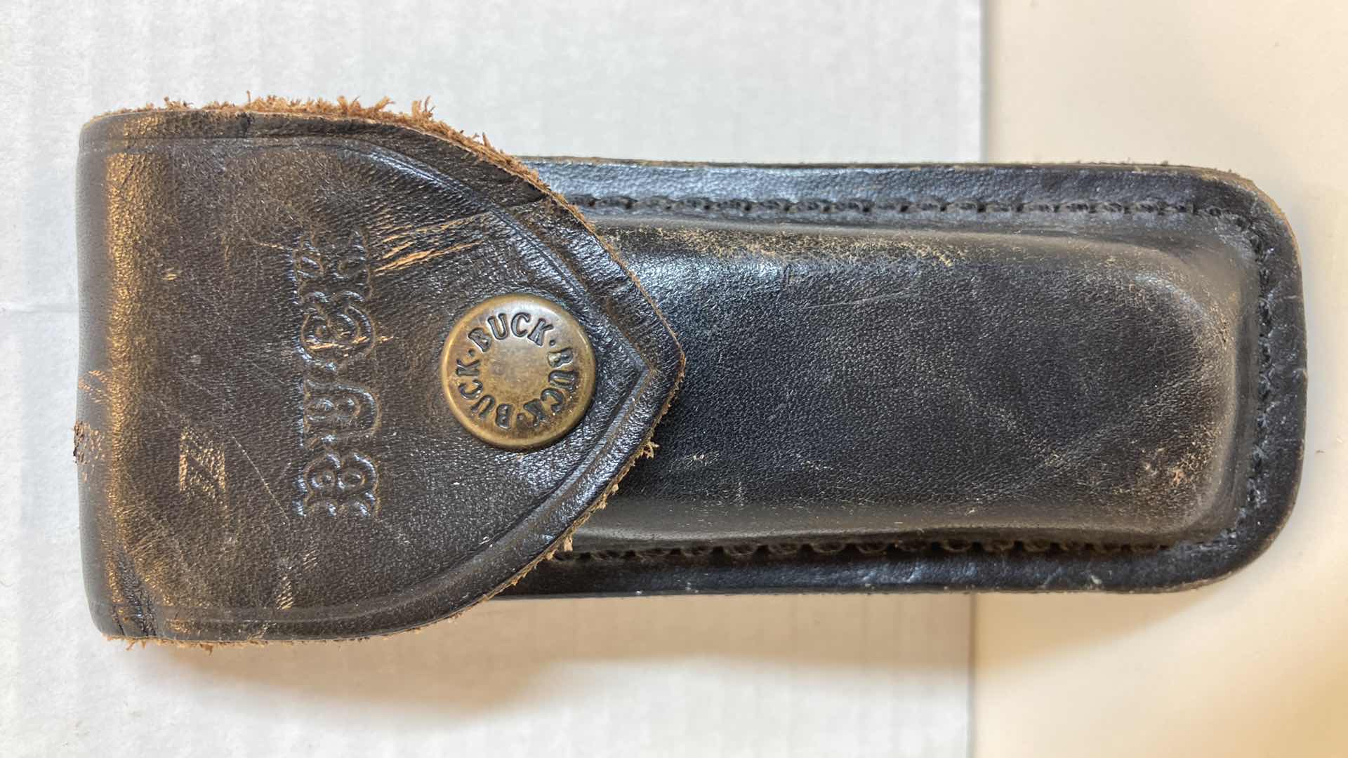 Photo 1 of BUCK 110 FOLDING KNIFE 3.75” W LEATHER SHEATH