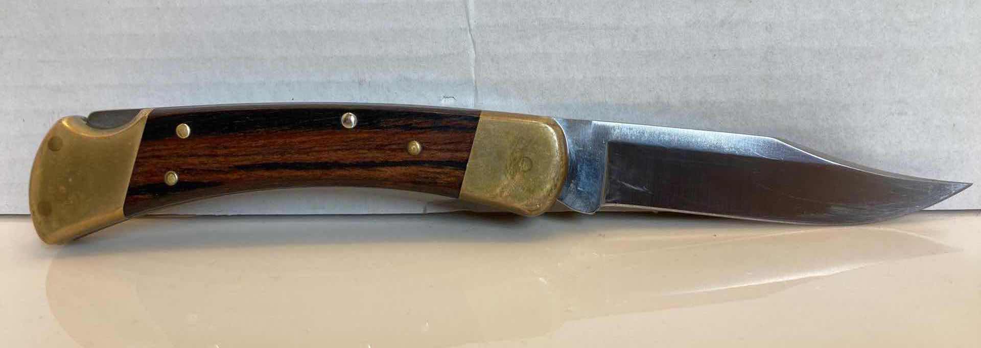 Photo 1 of BUCK 110 FOLDING KNIFE 3.75” W LEATHER SHEATH