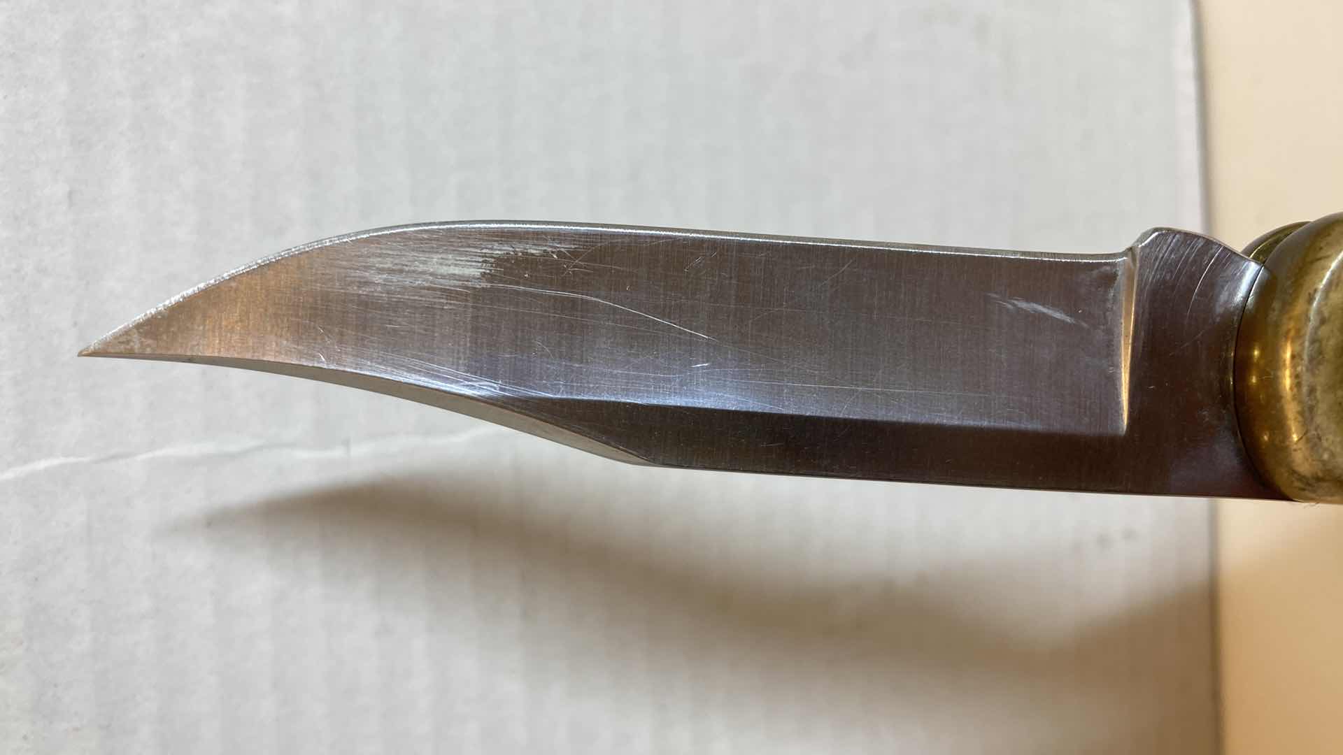 Photo 1 of BUCK 110 FOLDING KNIFE 3.75” W LEATHER SHEATH