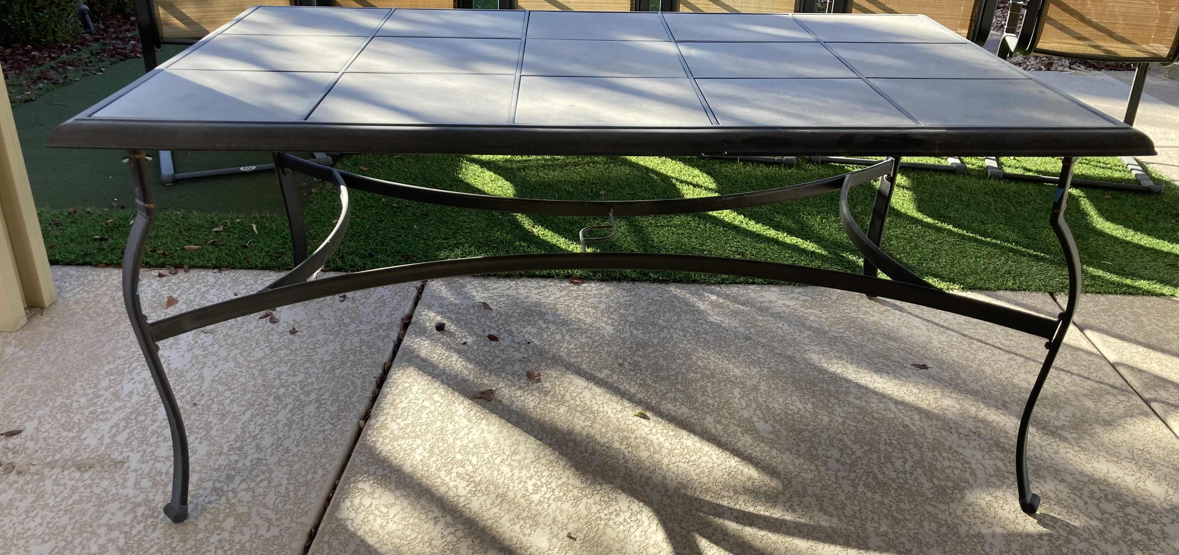View 3 of HAMPTON BAY TILE TOP PATIO TABLE 64” X 40 H29” & 6 CHAIRS 22” X 24” H40”