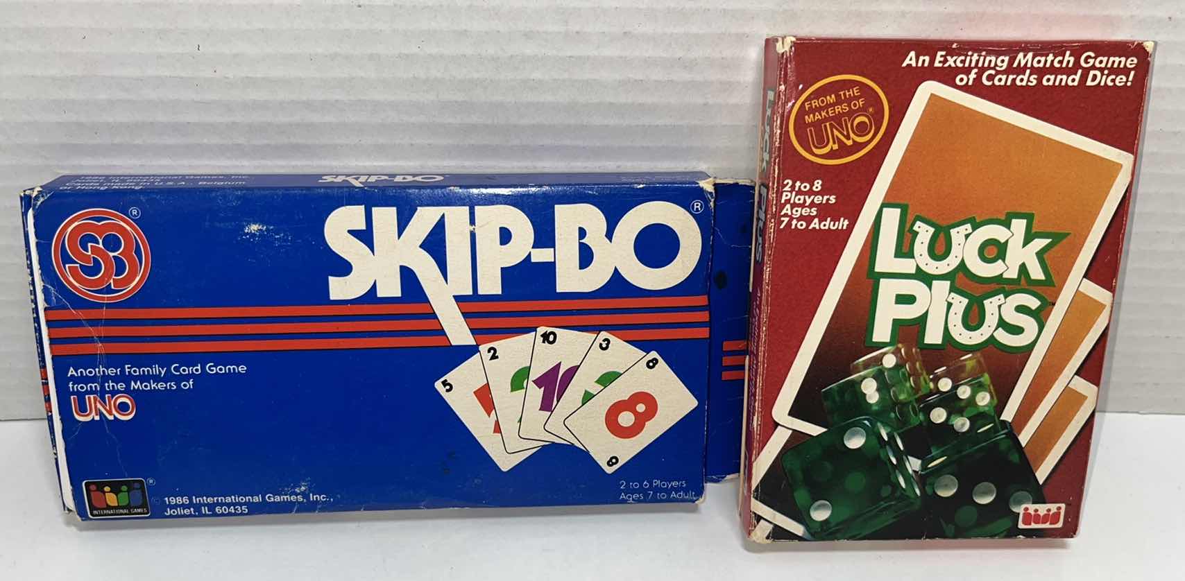 Photo 1 of CRANIUM, WORD RUMMY, SCRABBLE SLAM, SKIP-BO & LUCK PLUS CARD GAMES