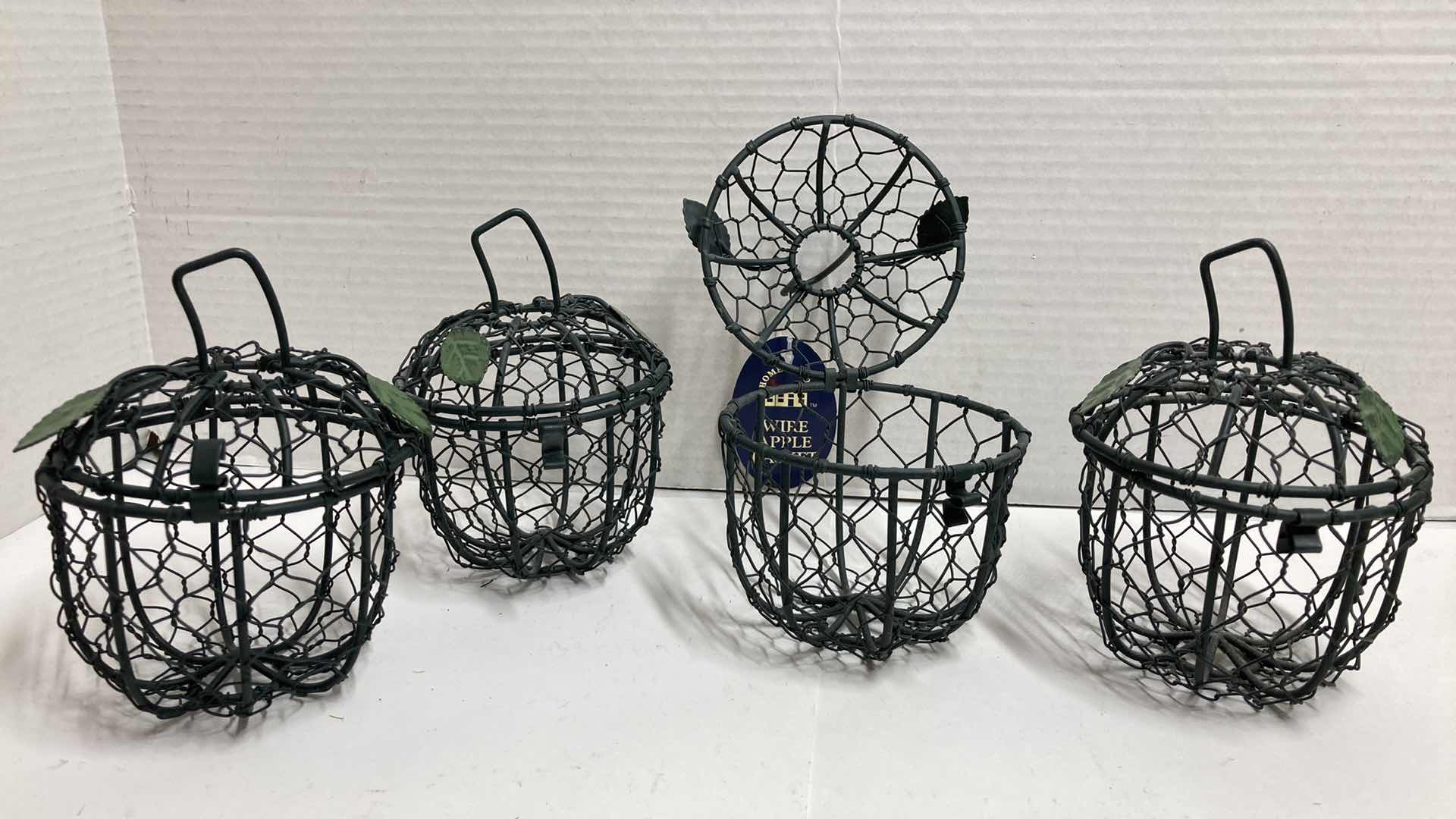 Photo 1 of IVY WICKER & METAL BASKET W WIRE APPLE BASKETS (4)