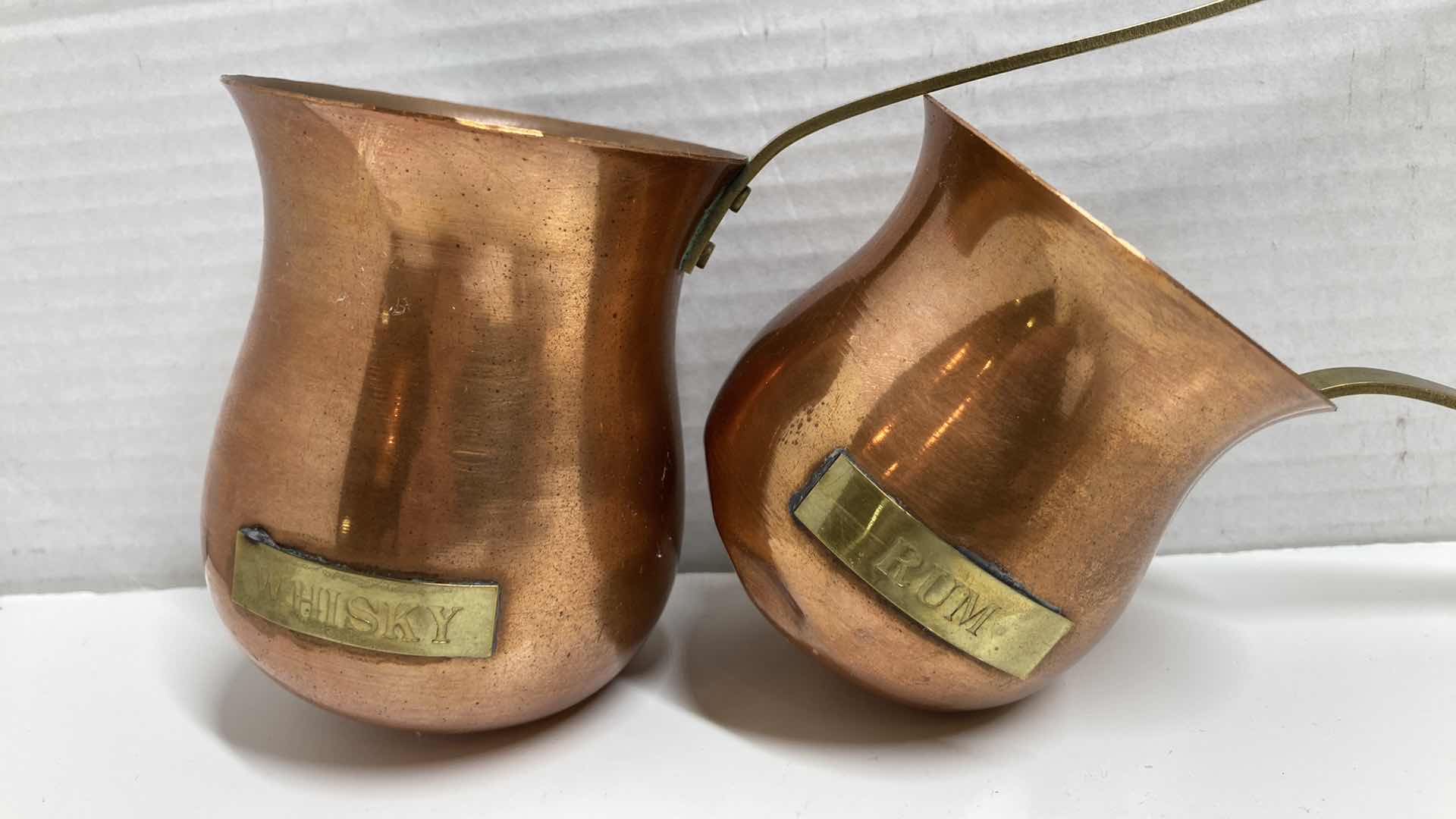 Photo 1 of EARLY-CENTURY WHISKY & RUM COPPER & BRASS LADDEL SET (2) 3” X 16”