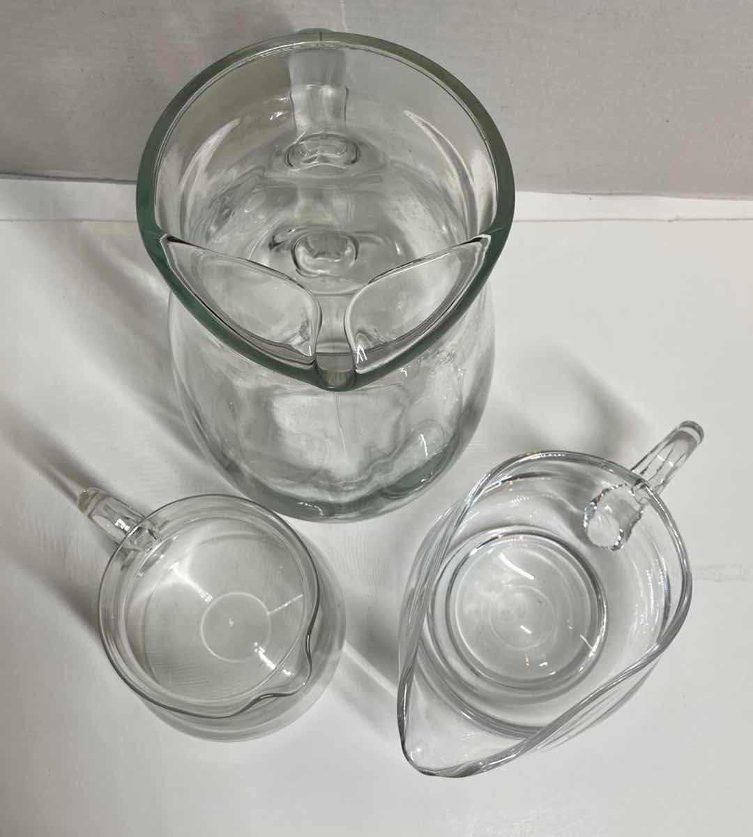 Photo 1 of CLEAR GLASS PITCHERS (3)