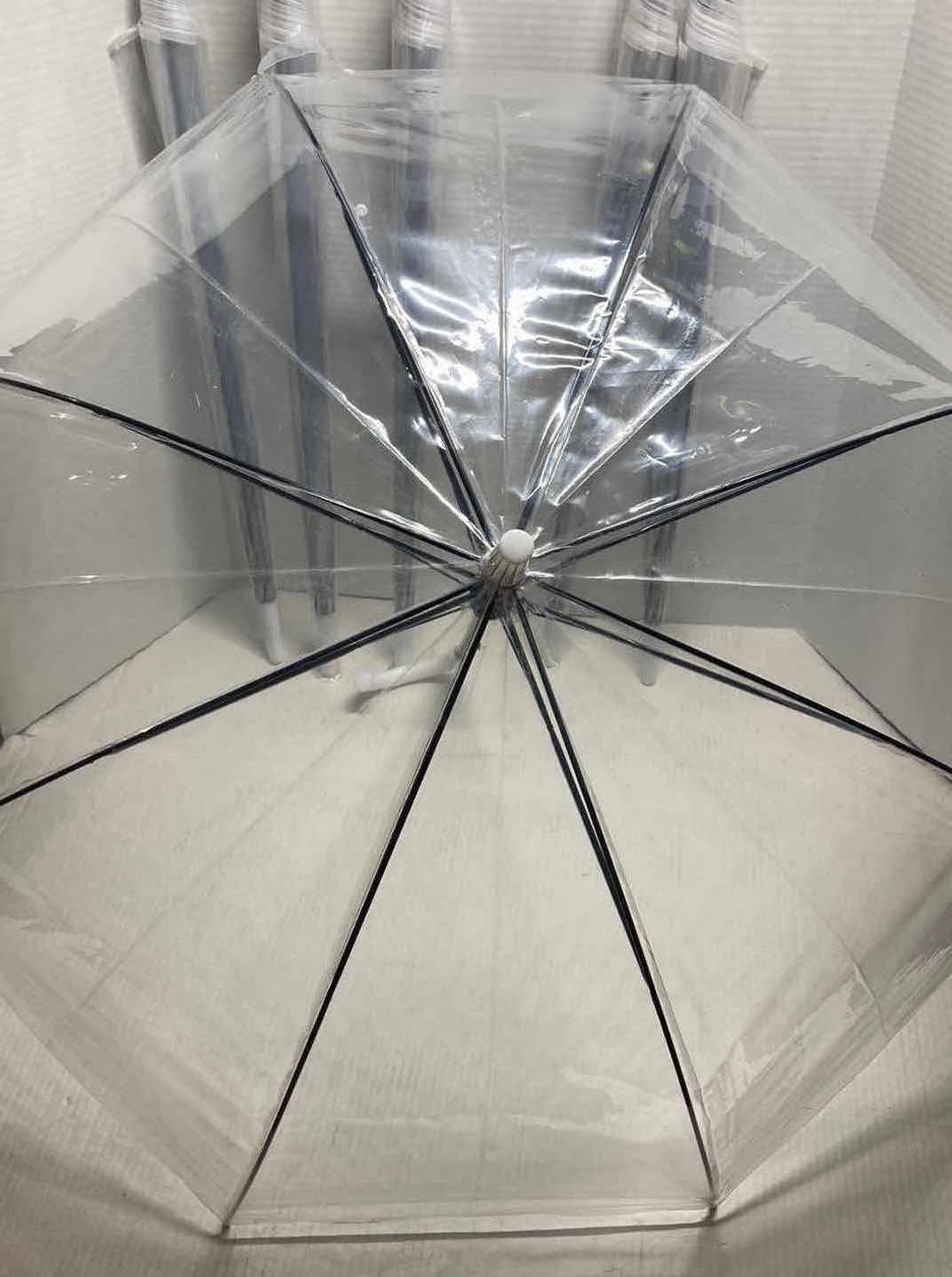 Photo 1 of CLEAR PLASTIC UMBRELLAS (6)