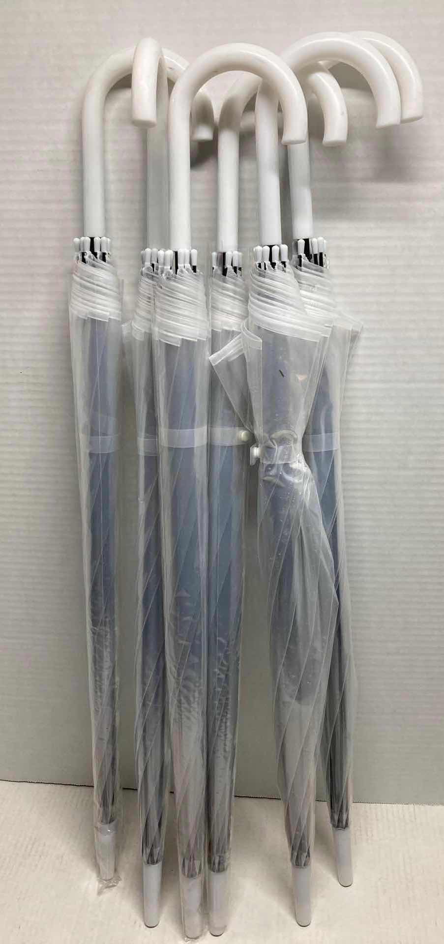 Photo 1 of CLEAR PLASTIC UMBRELLAS (6)