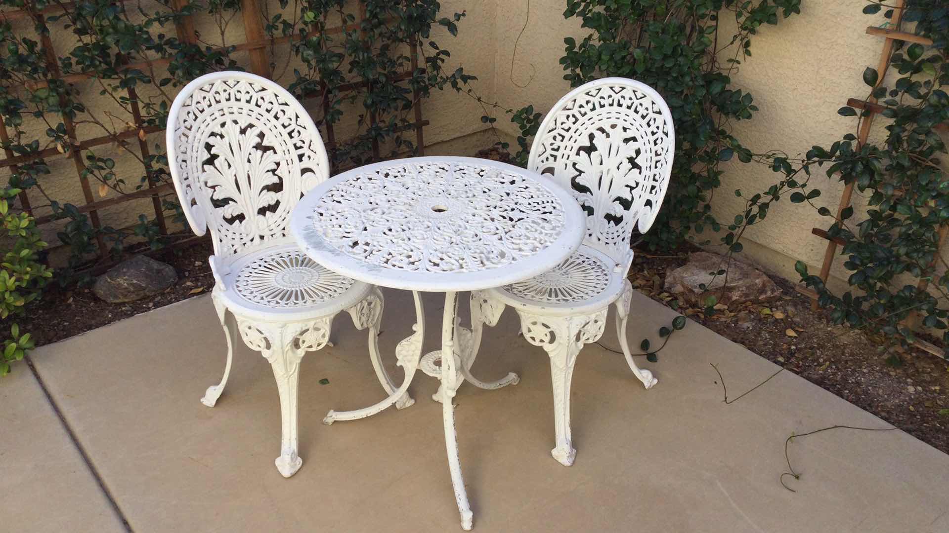 Photo 1 of CAST METAL OUTDOOR TABLE AND CHAIR SET