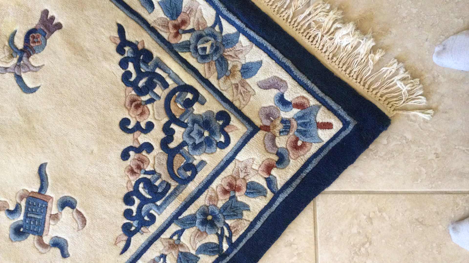 Photo 1 of BEIGE MULTI COLOR AREA RUG 96” X 66”