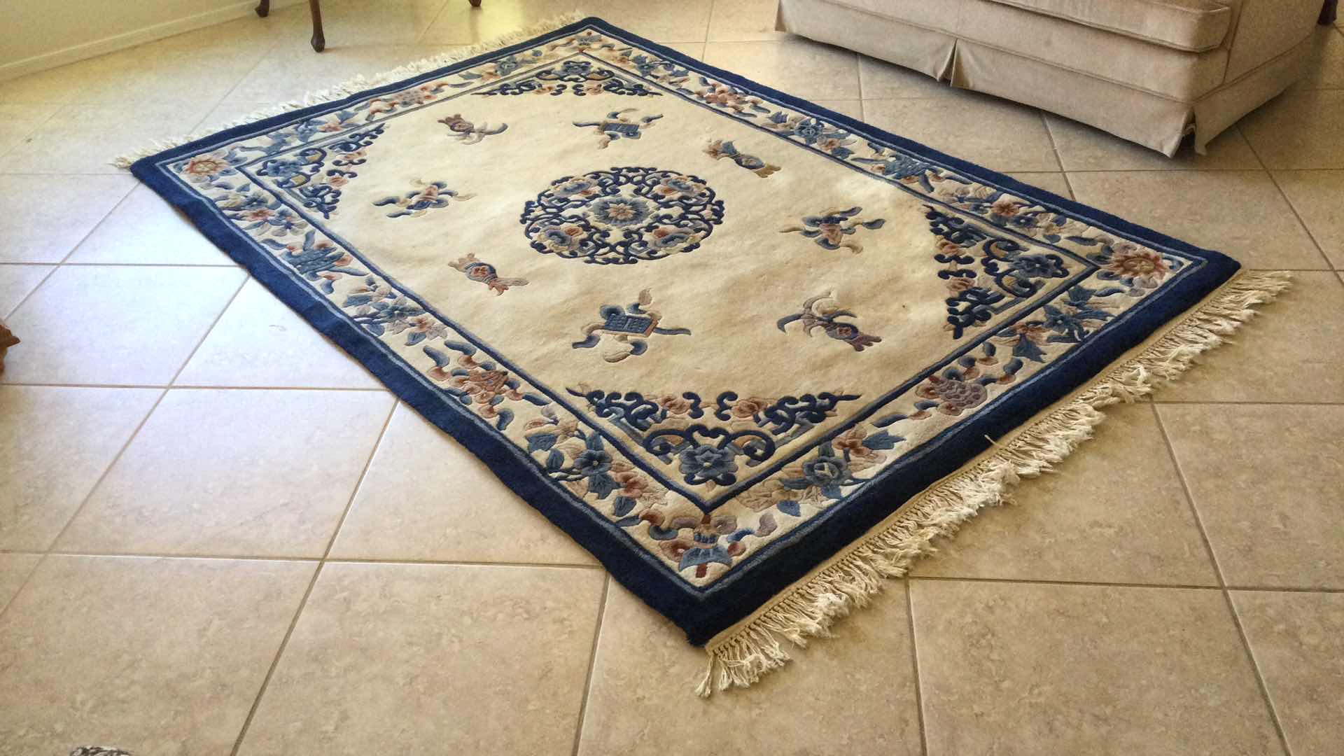 Photo 1 of BEIGE MULTI COLOR AREA RUG 96” X 66”