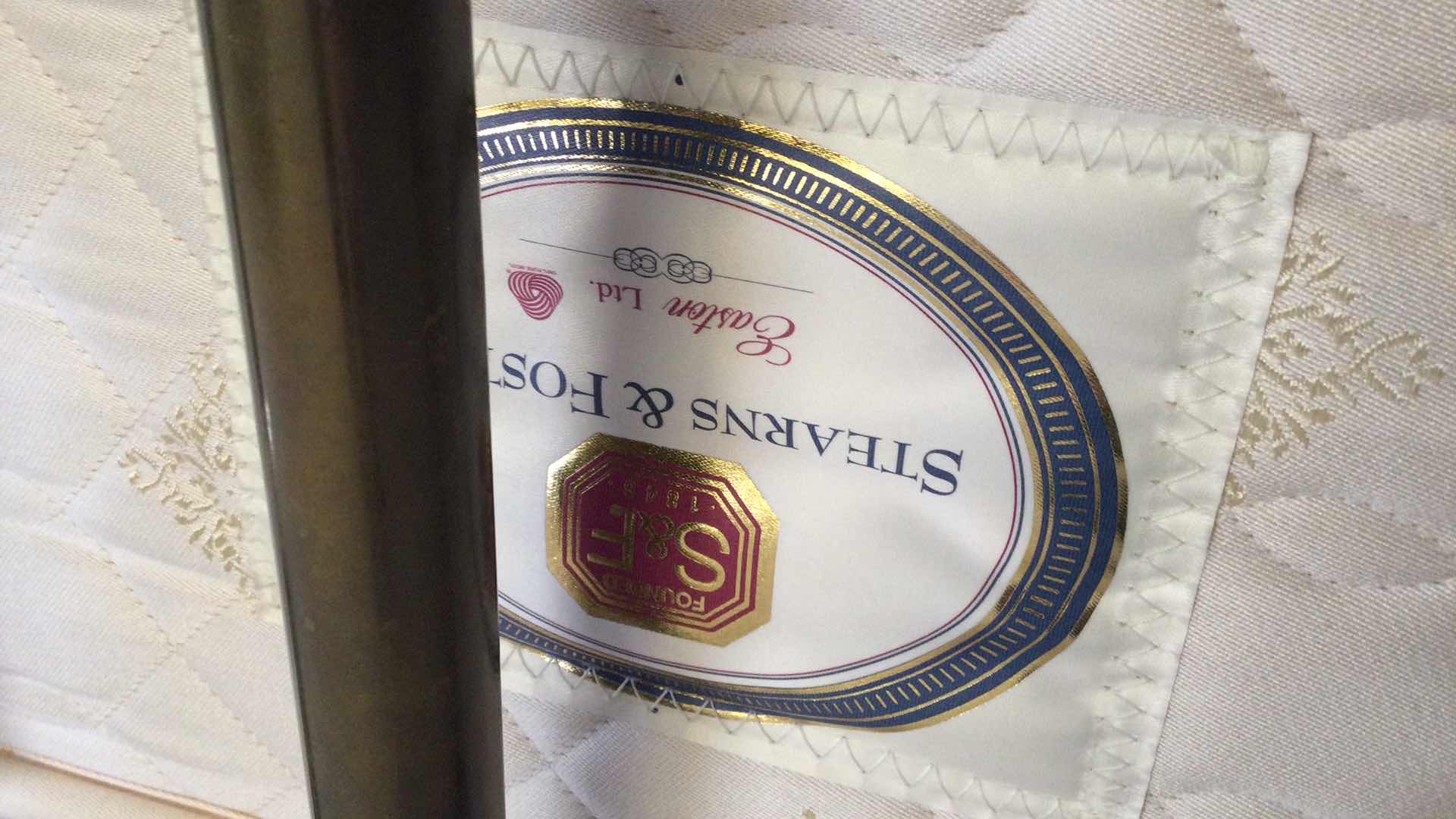 Photo 5 of KING SIZE BRASS HEAD & FOOTBOARDS W/ STEARNS & FOSTER DEEP POCKET MATTRESS & SPLIT BOX SPRINGS ON RAILS (BEDDING INCL.)