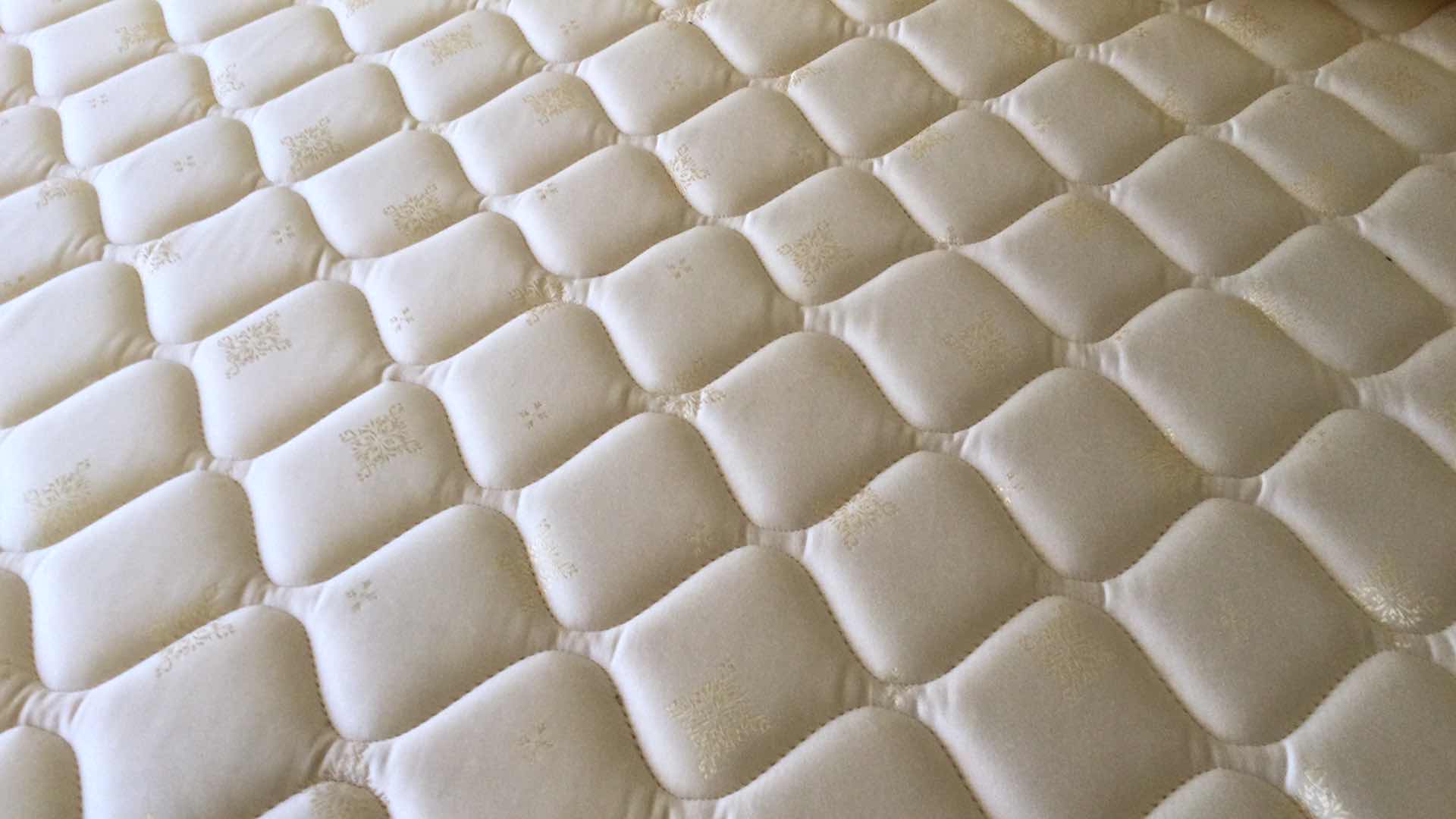 Photo 6 of KING SIZE BRASS HEAD & FOOTBOARDS W/ STEARNS & FOSTER DEEP POCKET MATTRESS & SPLIT BOX SPRINGS ON RAILS (BEDDING INCL.)