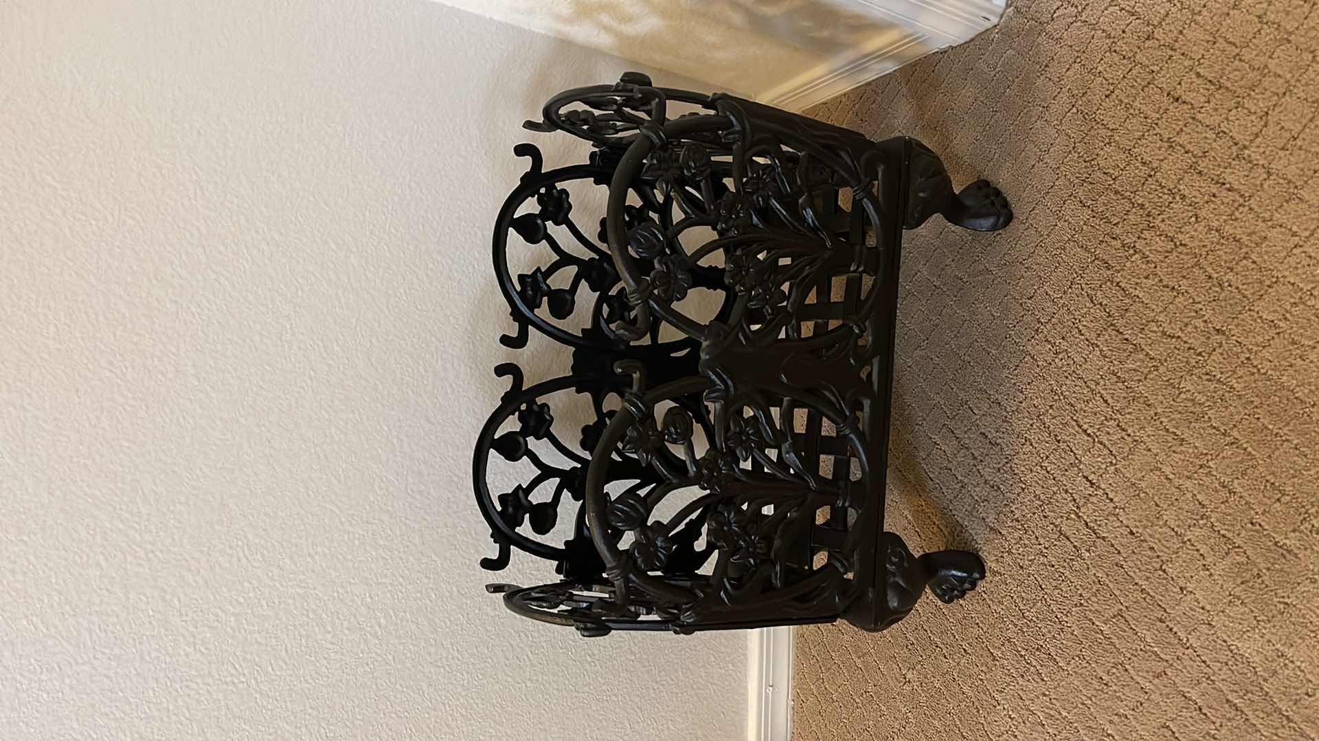 Photo 1 of SCULPTED CAST IRON MAGAZINE RACK 16” X 8.5” H 17”