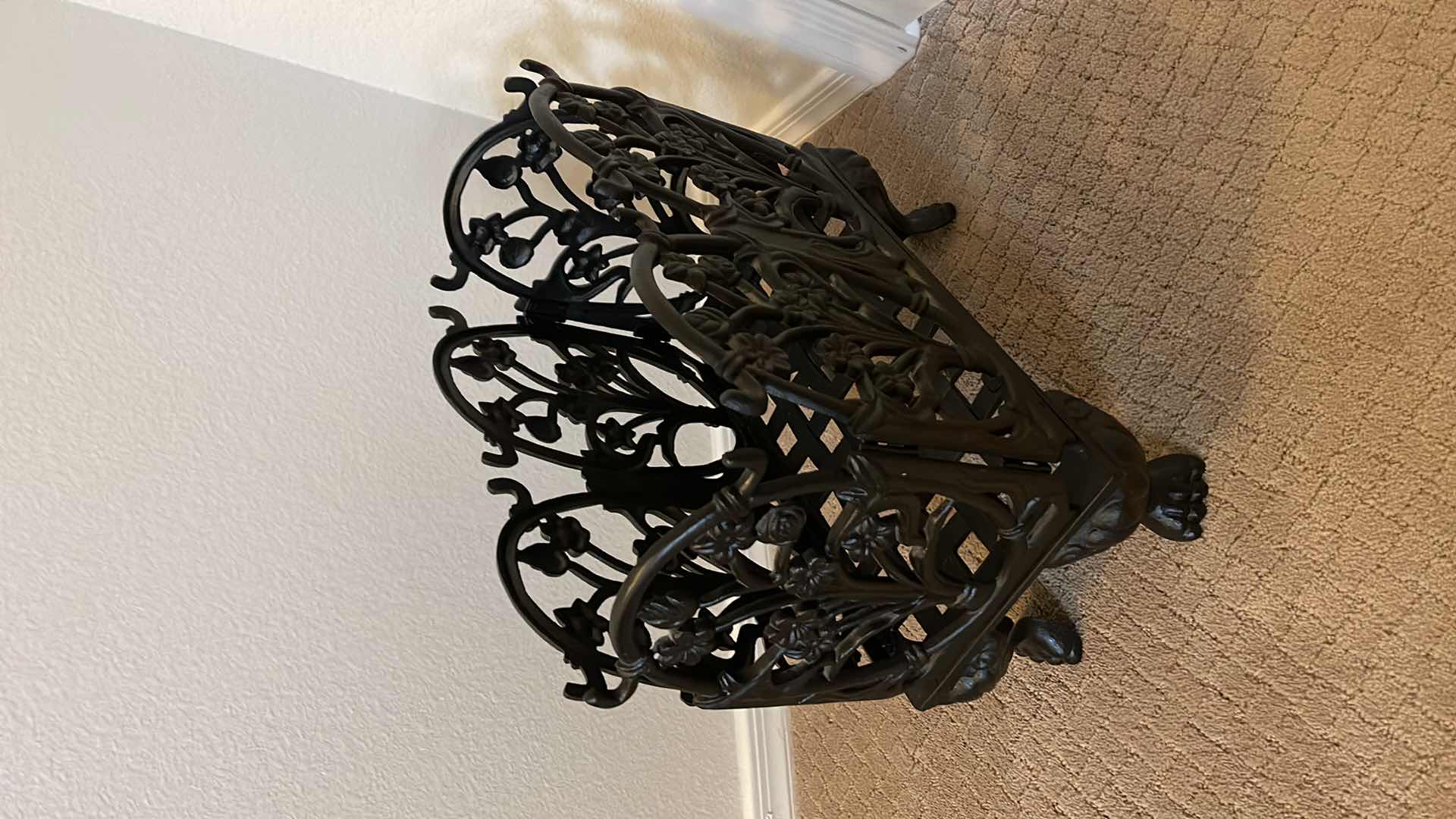 Photo 1 of SCULPTED CAST IRON MAGAZINE RACK 16” X 8.5” H 17”