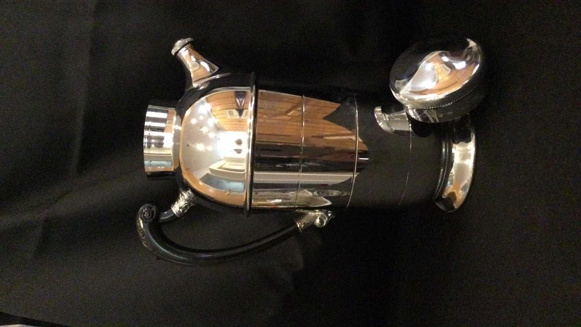 Photo 1 of BEVERAGE SERVE WARE: SILVER CARAFE W/ GLASS PITCHER