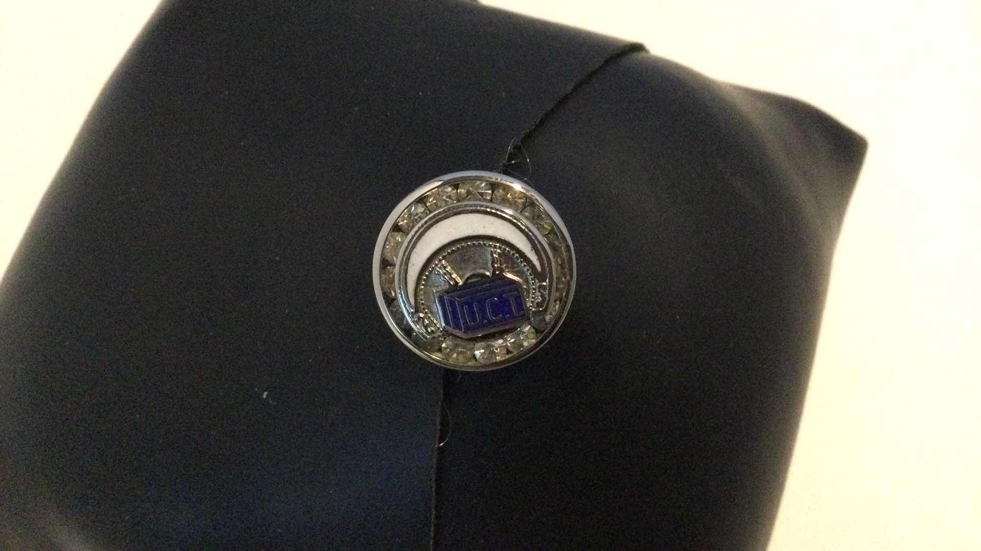 Photo 1 of VINTAGE U.C.T. TIE TAC / LAPEL PIN (UNITED COMMERCIAL TRAVELERS)