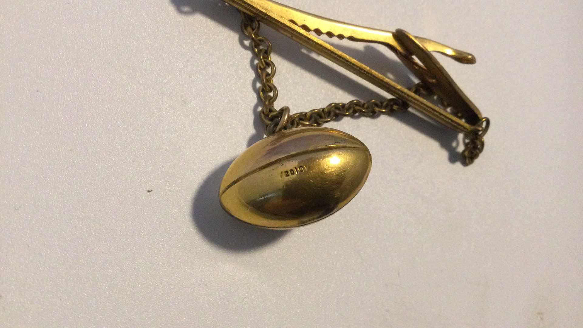 Photo 1 of 1950 ALL LEAGUE “NABISCO” TIE BAR W/FOOTBALL