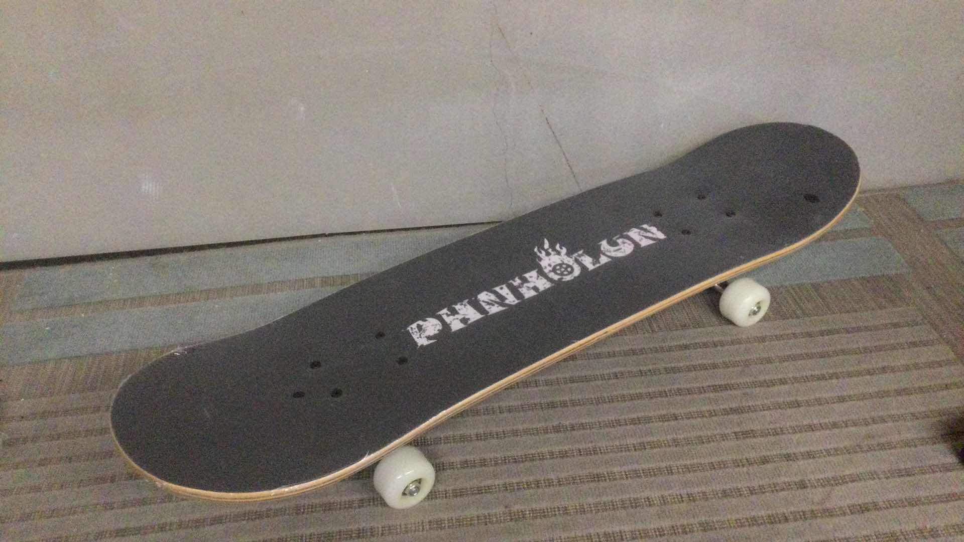 Photo 1 of NEW PHNHOLUN SKATE BOARD (REACH FOR THE STARS) 31” X 8”