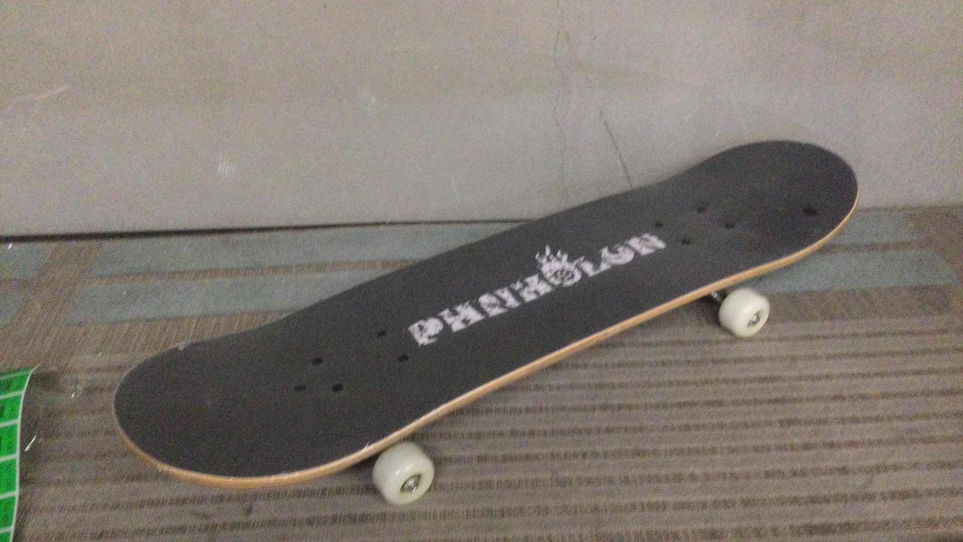 Photo 1 of NEW PHNHOLUN SKATE BOARD ( REACH FOR THE STARS) 31” X 8”