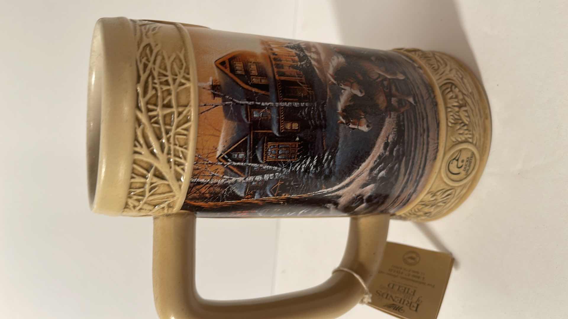 Photo 1 of MILLER GENUINE DRAFT COLLECTOR BEER STEINS