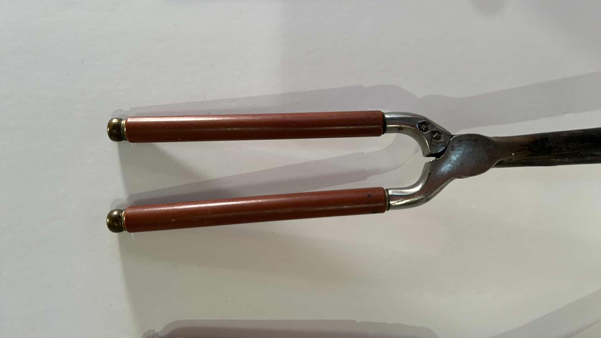 Photo 1 of ANTIQUE CURLING IRONS