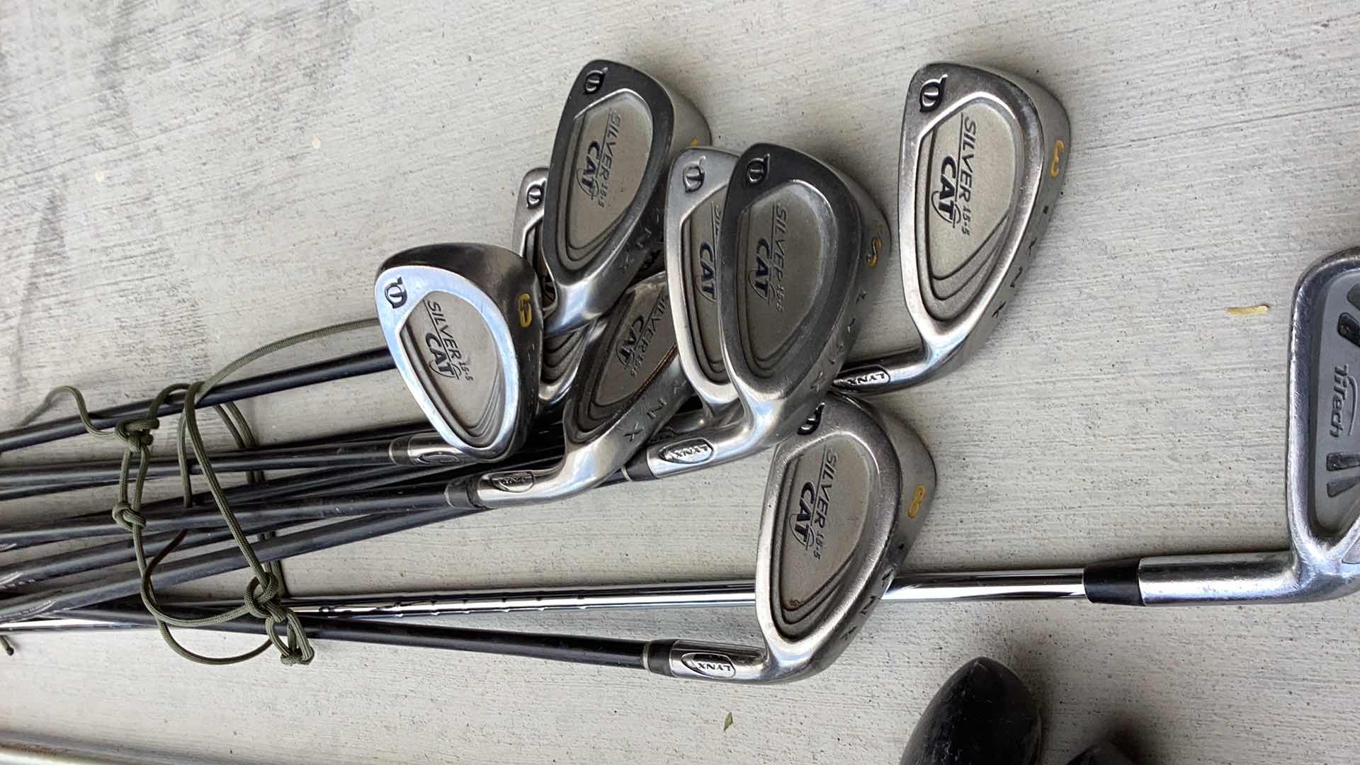 Photo 1 of ASSORTED GOLF CLUBS LYNX DUNLOP