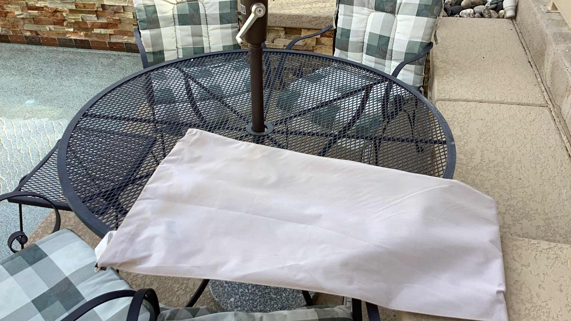 Photo 1 of O.W. LEE METAL OUTDOOR PATIO SET INCLUDES UMBRELLA, TWO SMALL TABLES AND UMBRELLA STAND