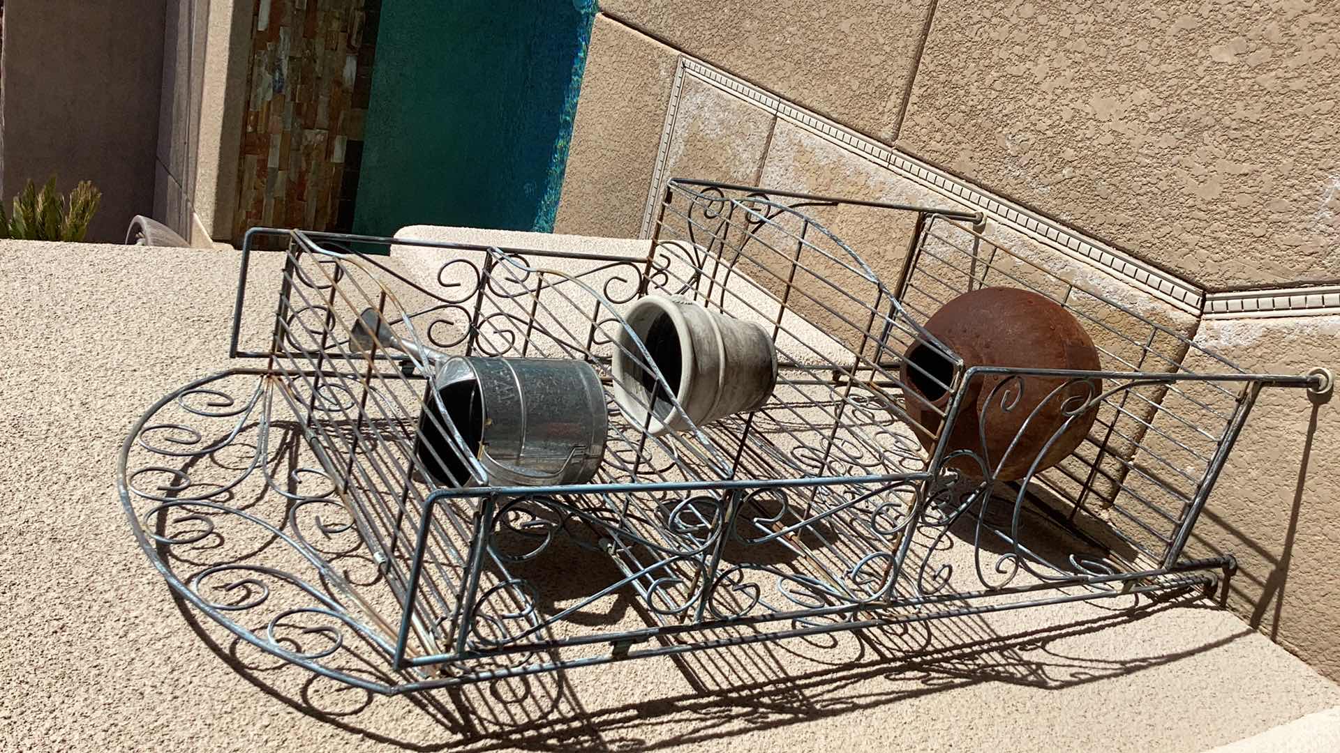 Photo 1 of OUTDOOR METAL FOUR SHELF STAND 28" X 15" H60" INCLUDES POTS