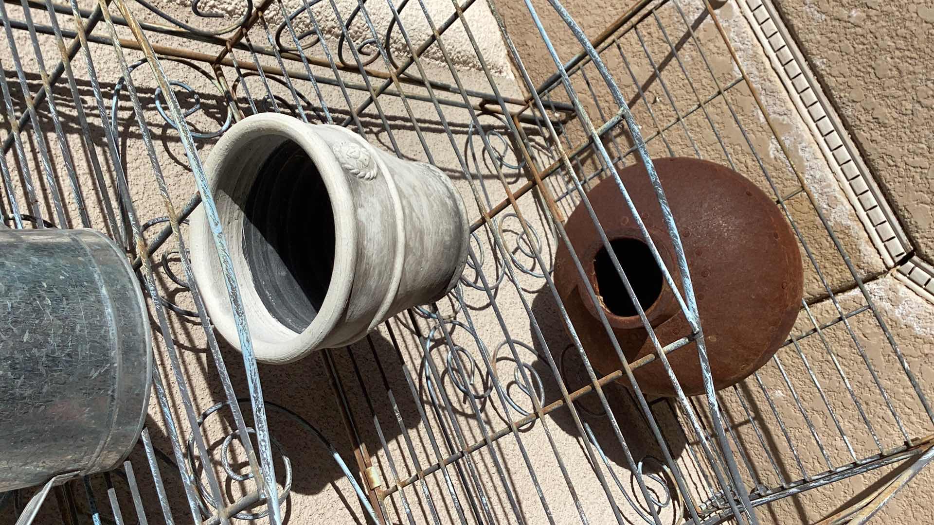 Photo 1 of OUTDOOR METAL FOUR SHELF STAND 28" X 15" H60" INCLUDES POTS