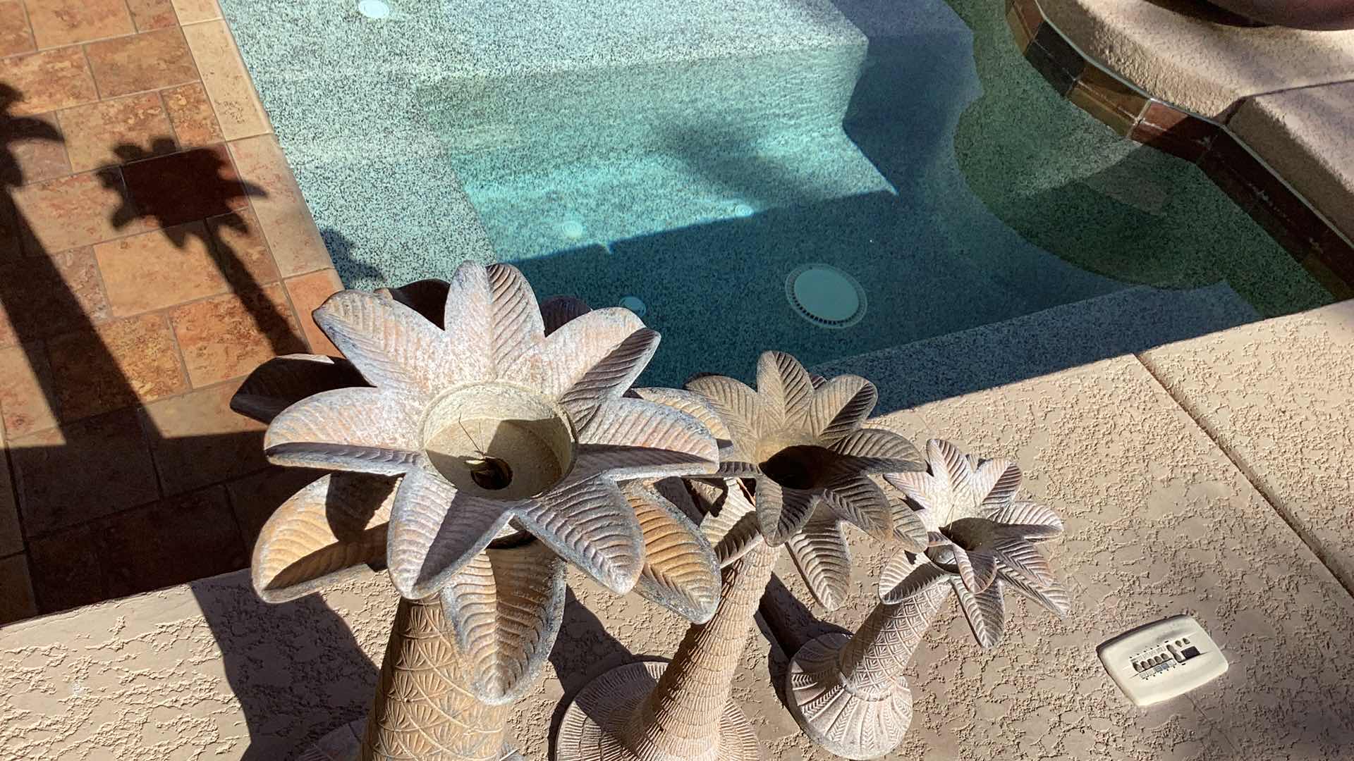 Photo 1 of OUTDOOR METAL 3  PALM TREE  CANDLE HOLDERS LARGEST 11" X 23"
