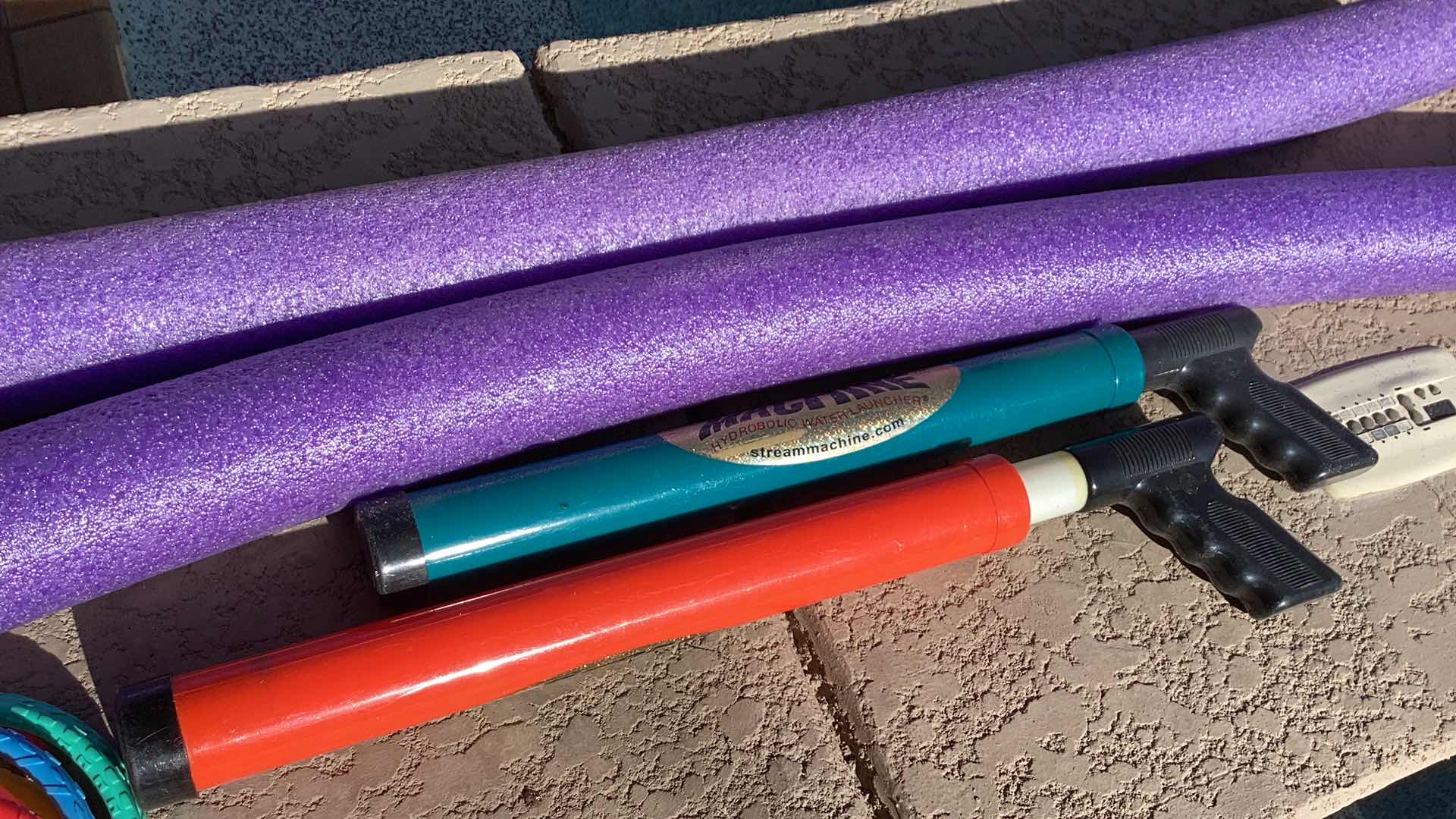 Photo 1 of POOL NOODLES AND TOY ASSORTMENT