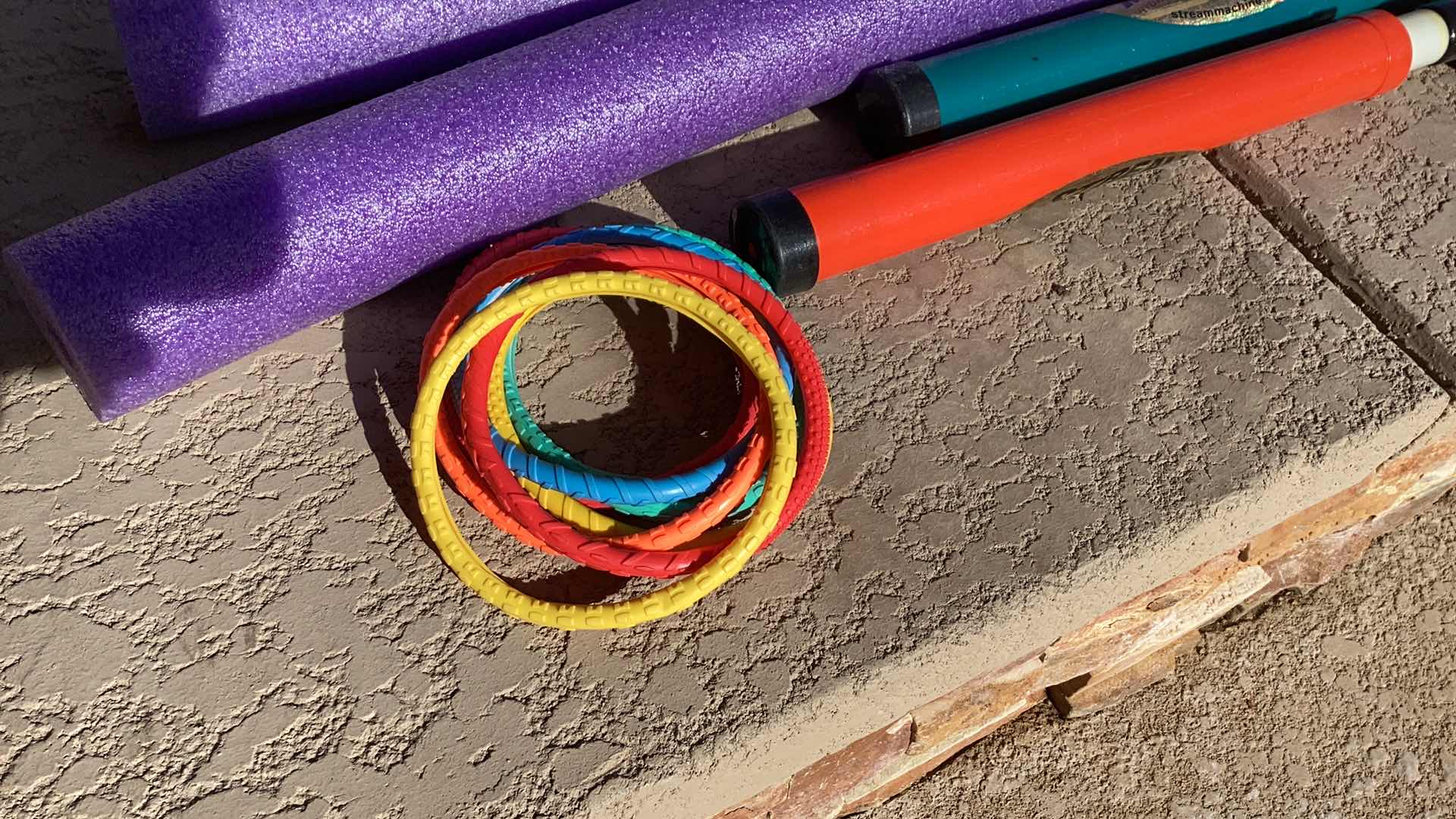 Photo 1 of POOL NOODLES AND TOY ASSORTMENT