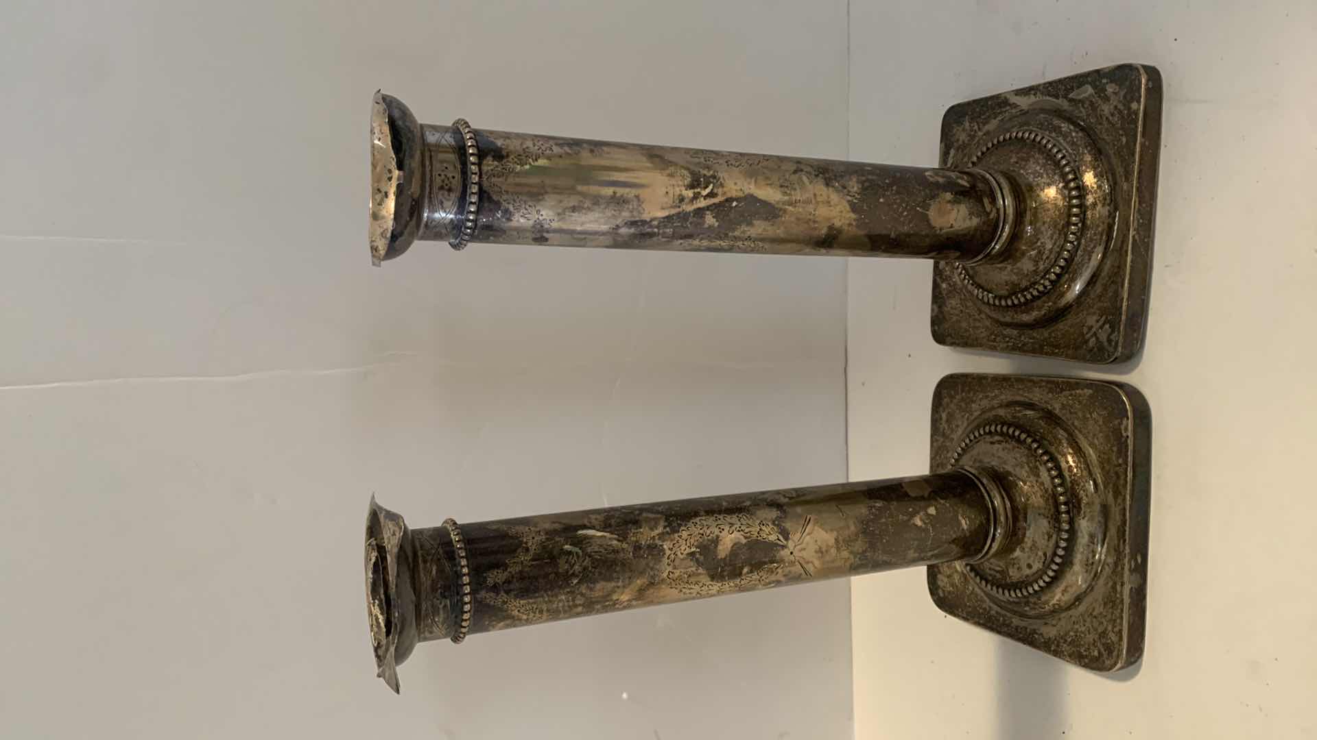 Photo 1 of 2 SETS CANDLE HOLDERS, ONE IS STAMPED STERLING SILVER, THE OTHER MADE IN BRITAIN