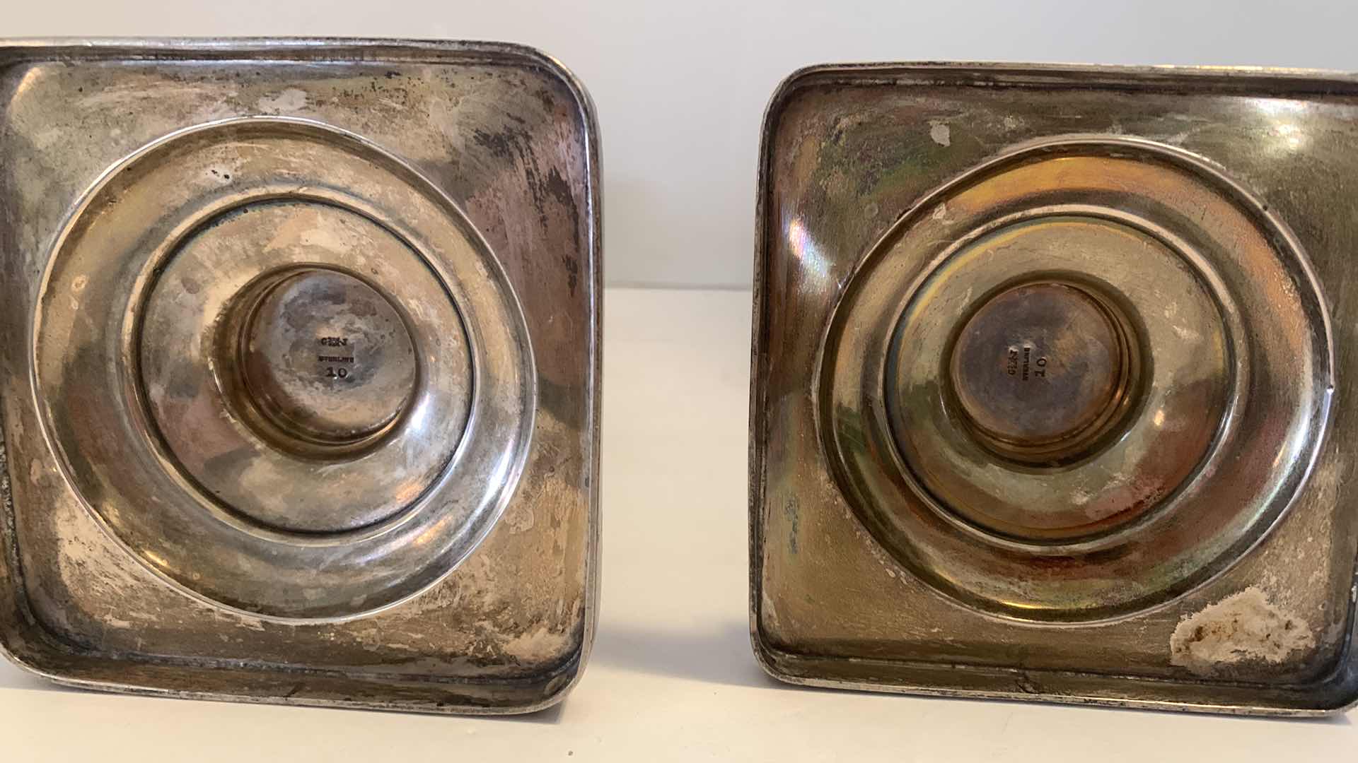 Photo 1 of 2 SETS CANDLE HOLDERS, ONE IS STAMPED STERLING SILVER, THE OTHER MADE IN BRITAIN