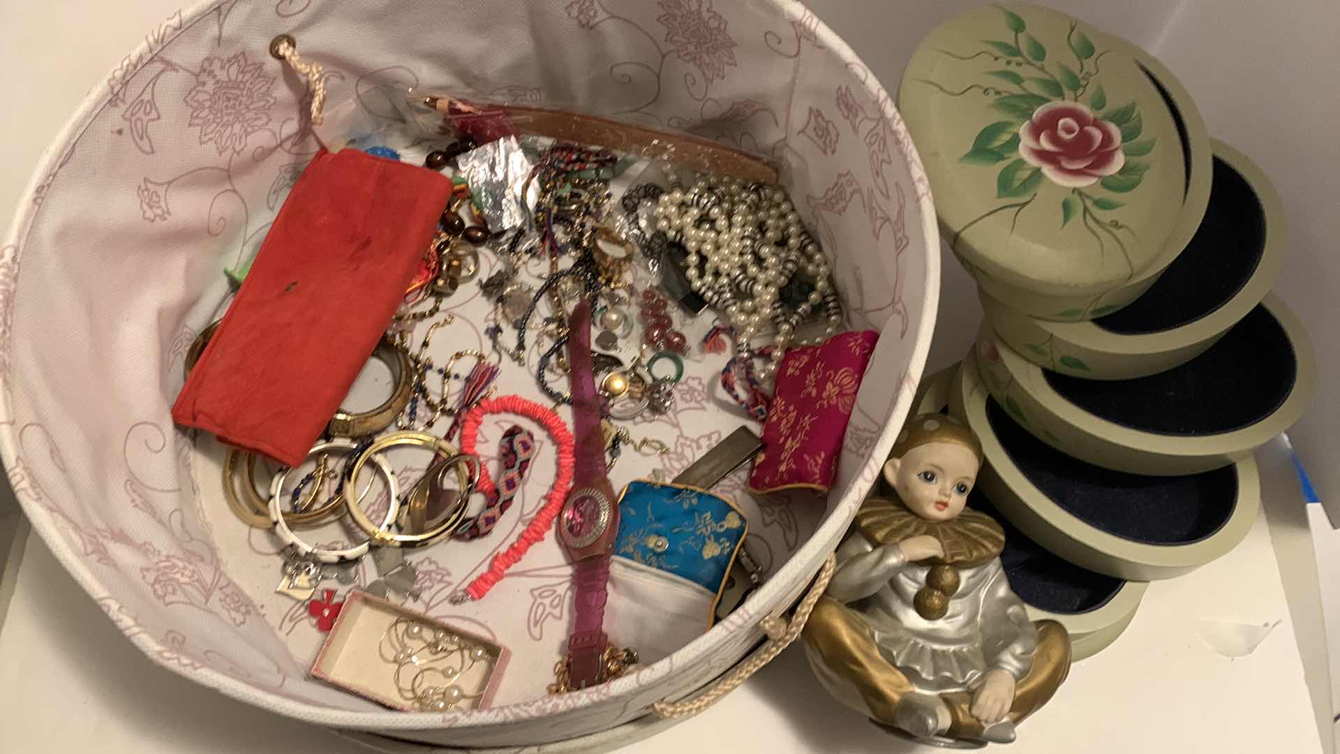 Photo 1 of COSTUME JEWELRY ASSORTMENT IN HAT BOX, CLOWN MUSIC BOX AND JEWELRY BOX