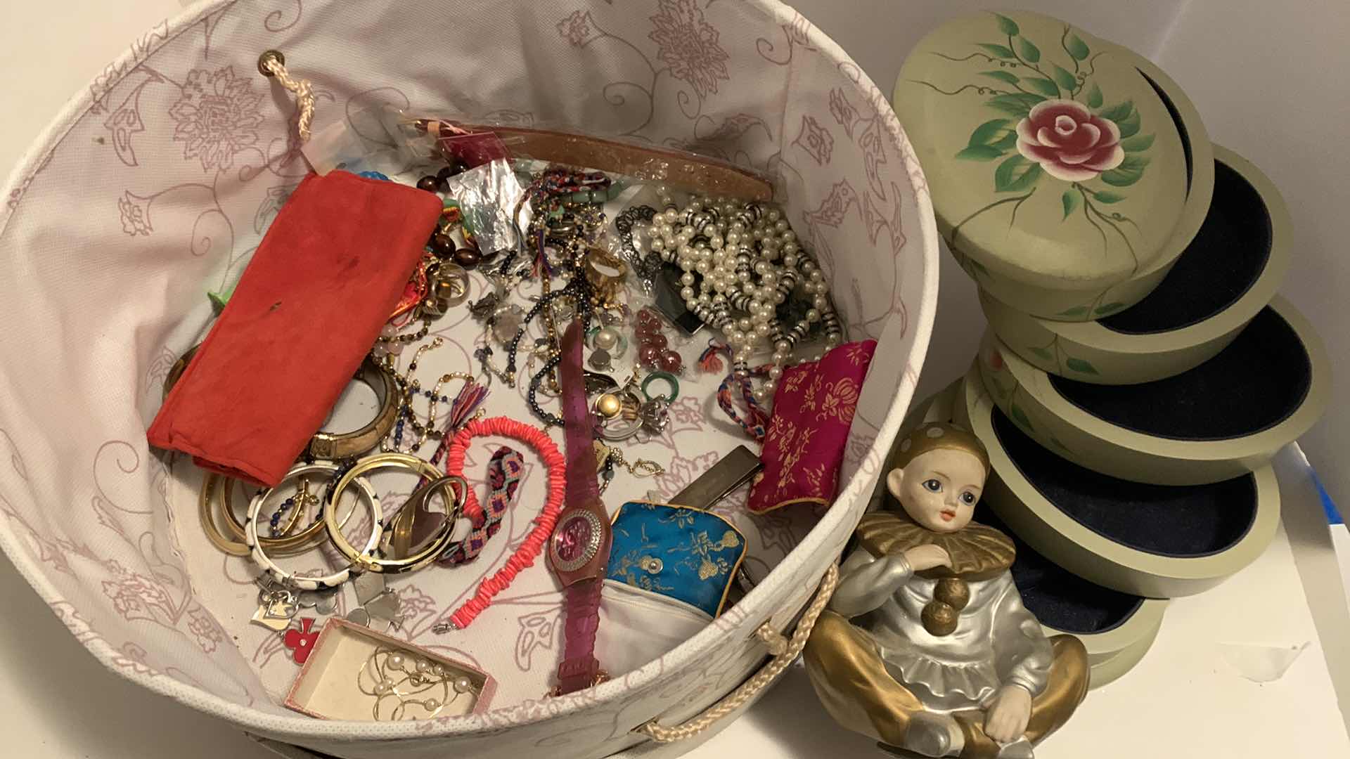 Photo 1 of COSTUME JEWELRY ASSORTMENT IN HAT BOX, CLOWN MUSIC BOX AND JEWELRY BOX