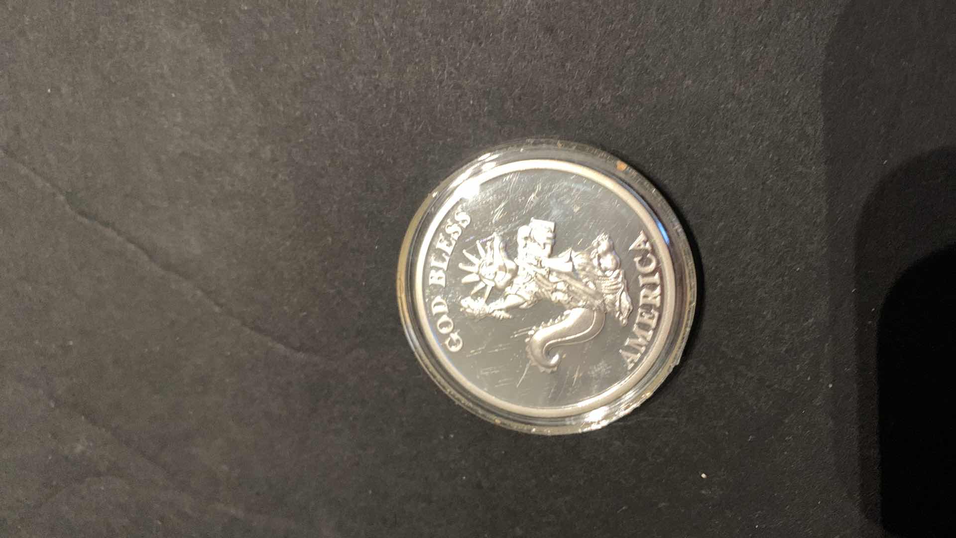 Photo 1 of .999 PURE SILVER DOLLAR SIZE COIN